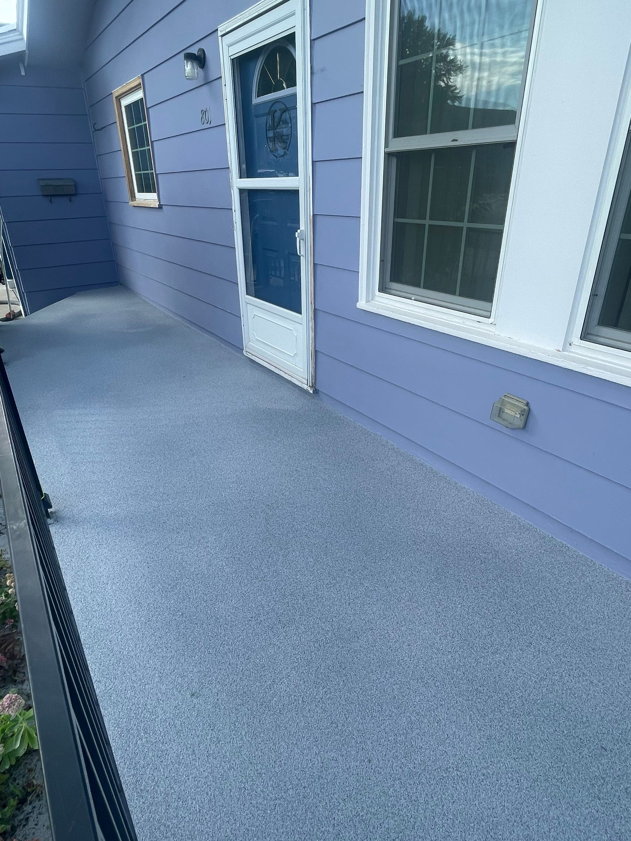 Sioux Falls Concrete Porch Coating with Starry Evening Finish by Select Painting, Coatings & Garage Cabinets