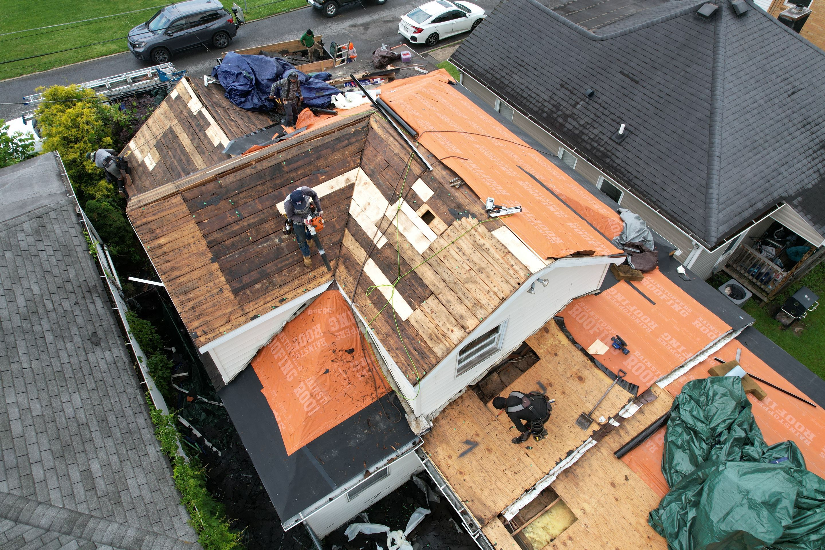 Residential Roofing Installation using GAF Timberline HDZ Charcoal by Rainstoppers Roofing
