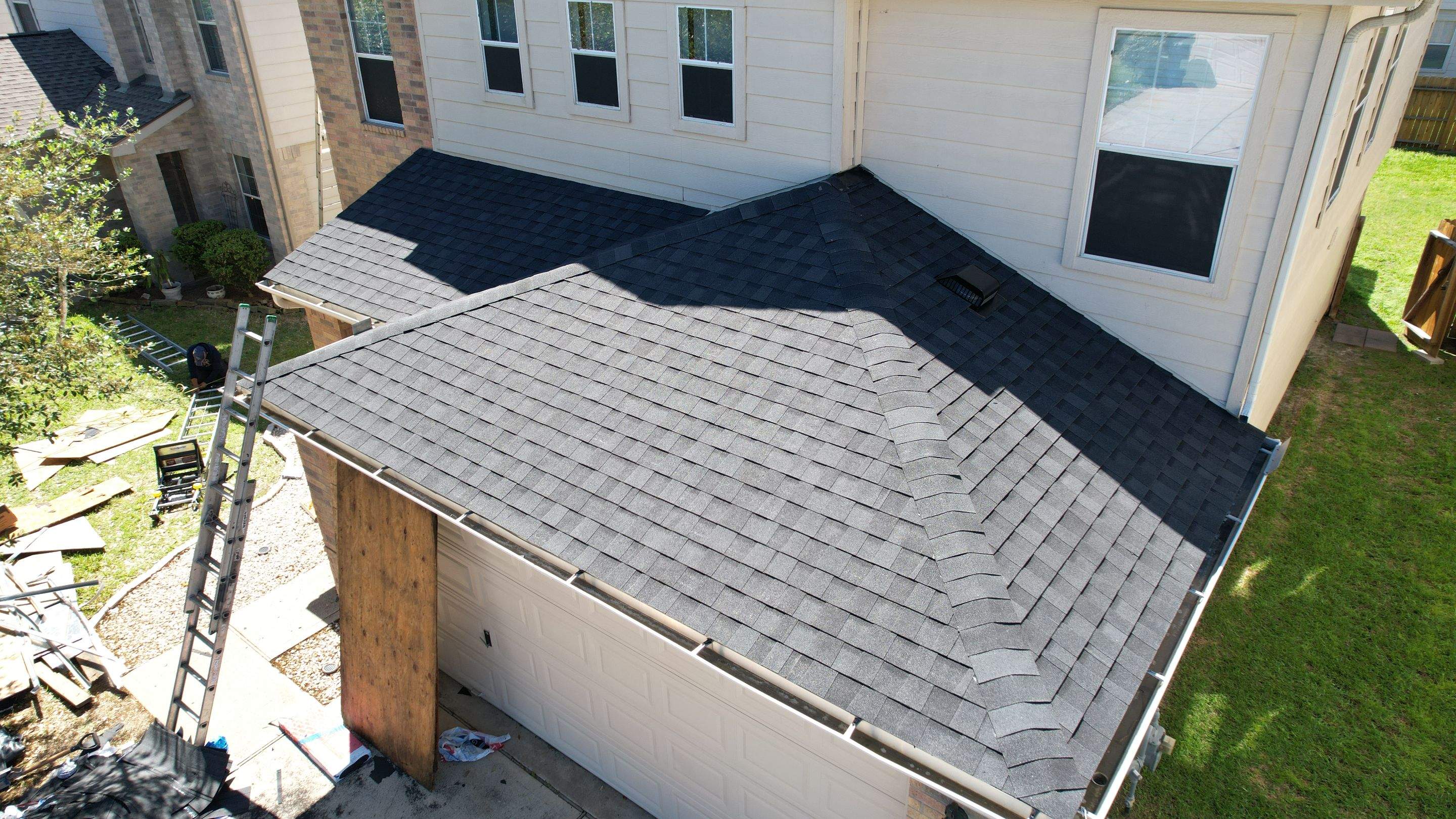 Complete Charcoal-Gray Roof Replacement — Spring, TX by PL Roofing & SB Roofing, LLC.