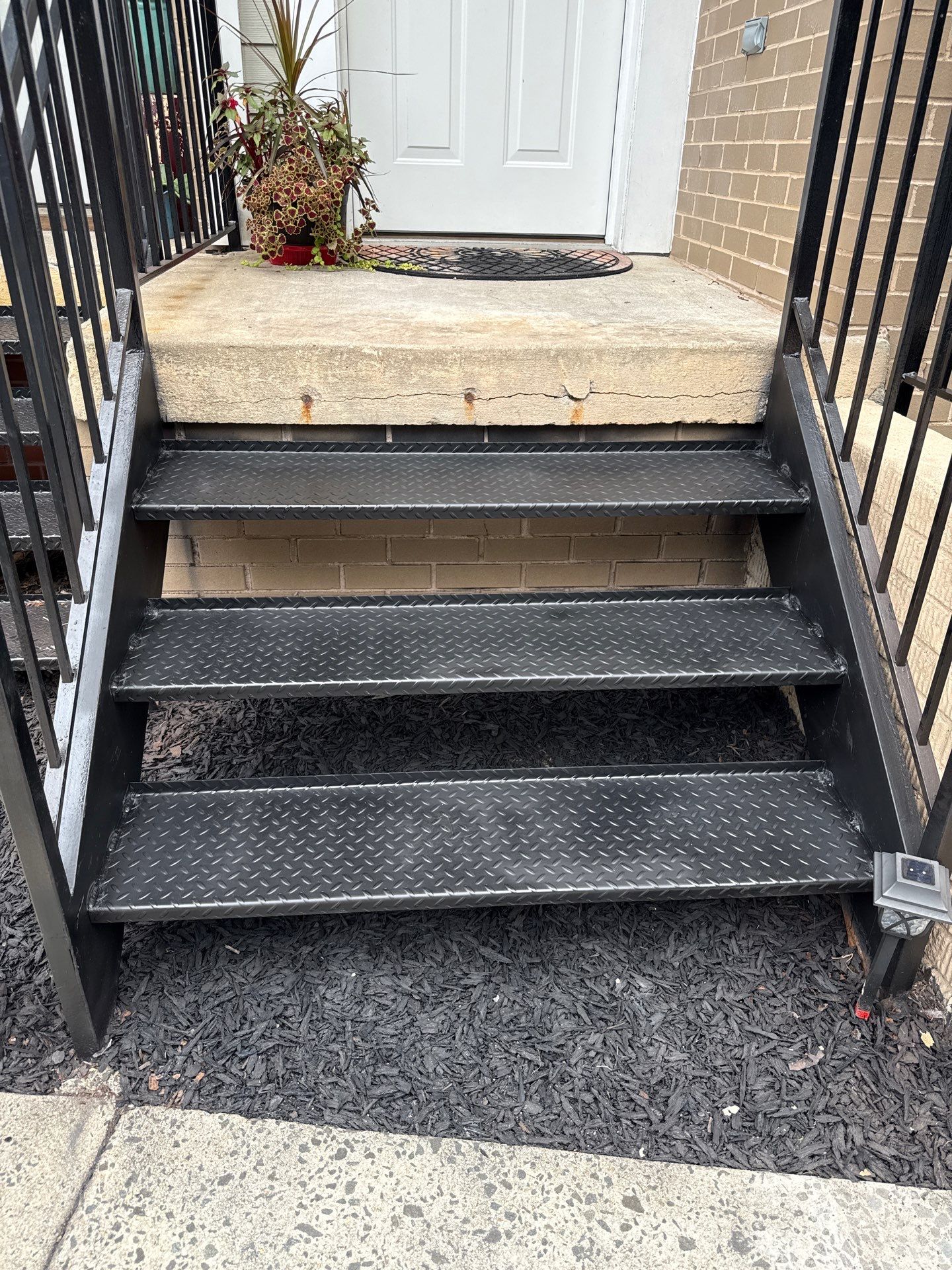 Black Metal Diamond Plate Staircase Restoration in Washington, DC by Capitol Iron Works