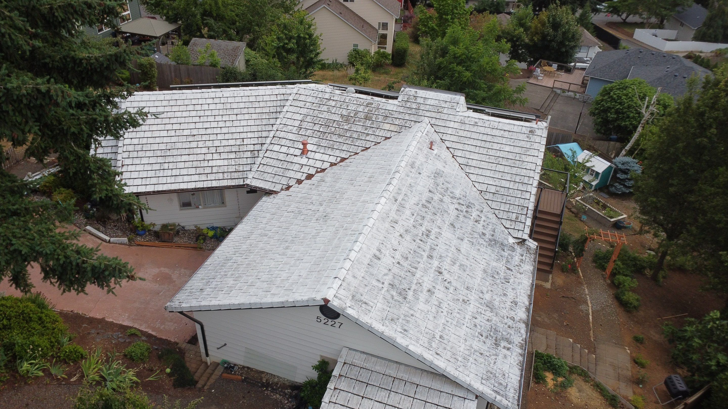 Granite Black Residential Roof Replacement by Orezona Building & Roofing Company, Inc.