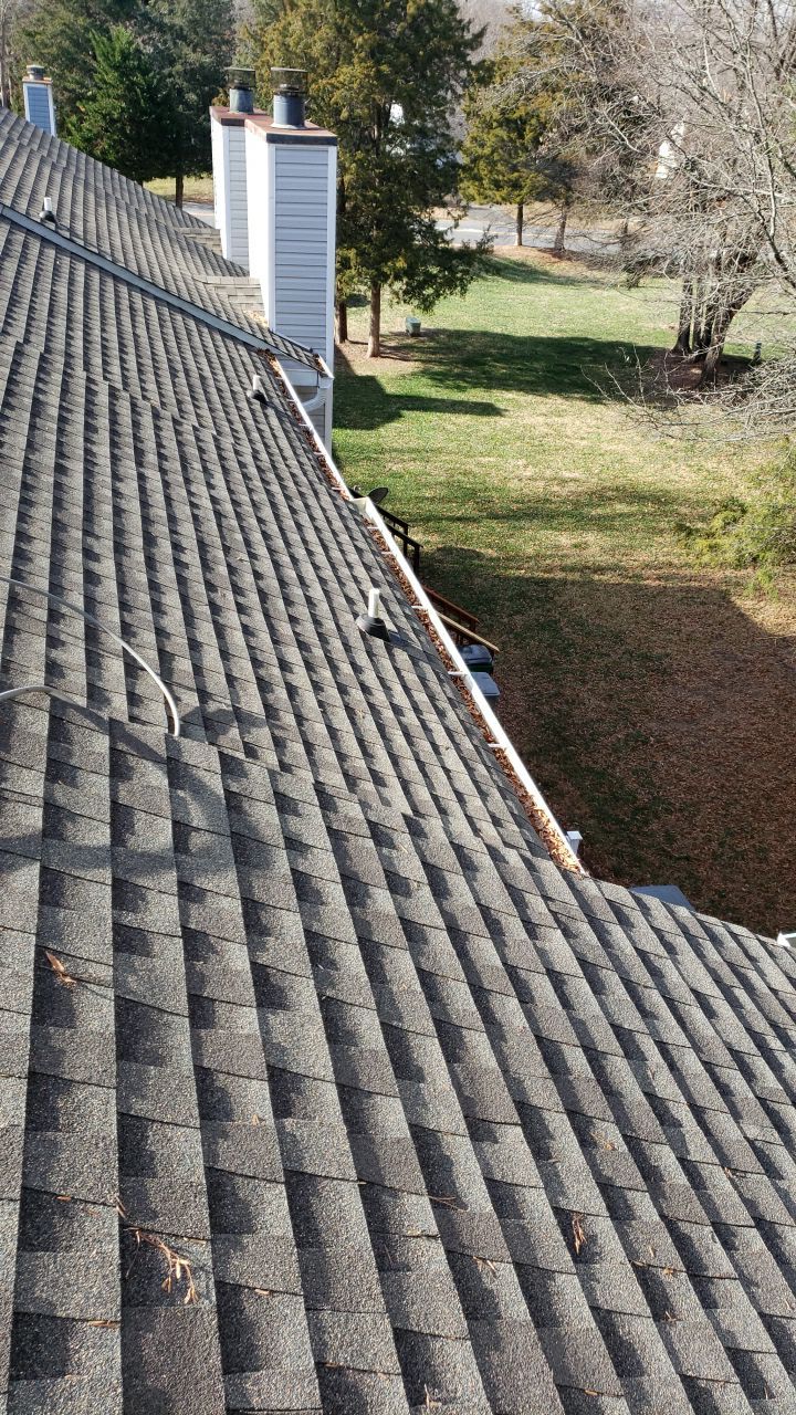 Gutter Cleaning using water by Power Wash Masters LLC
