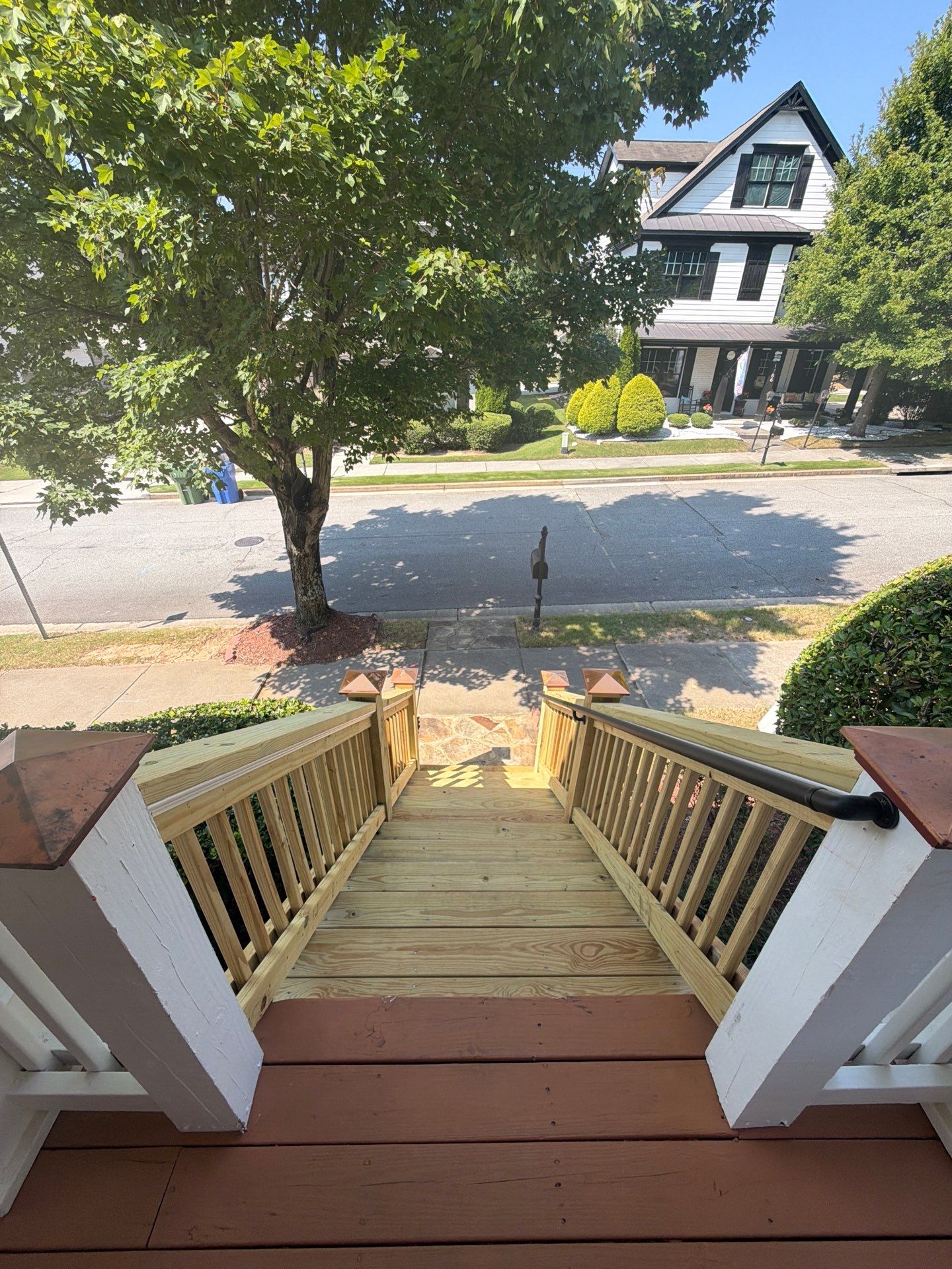 Atlanta Exterior Home Refresh with Blue Siding and Deck Staining by Swift Home Renovations 
