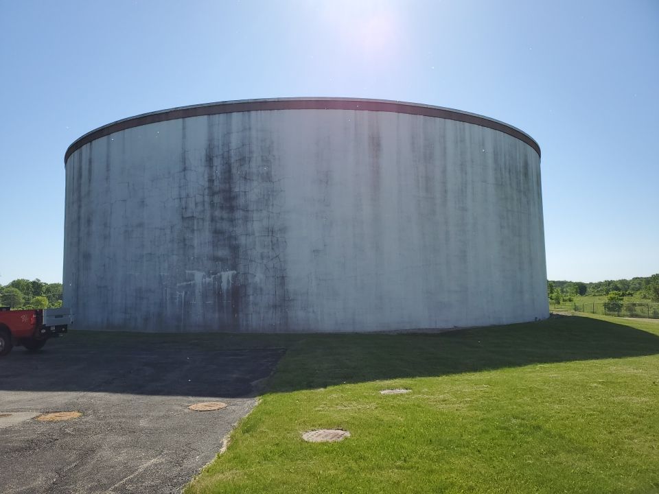 Water tank cleaning by Northern Power Washing LLC.