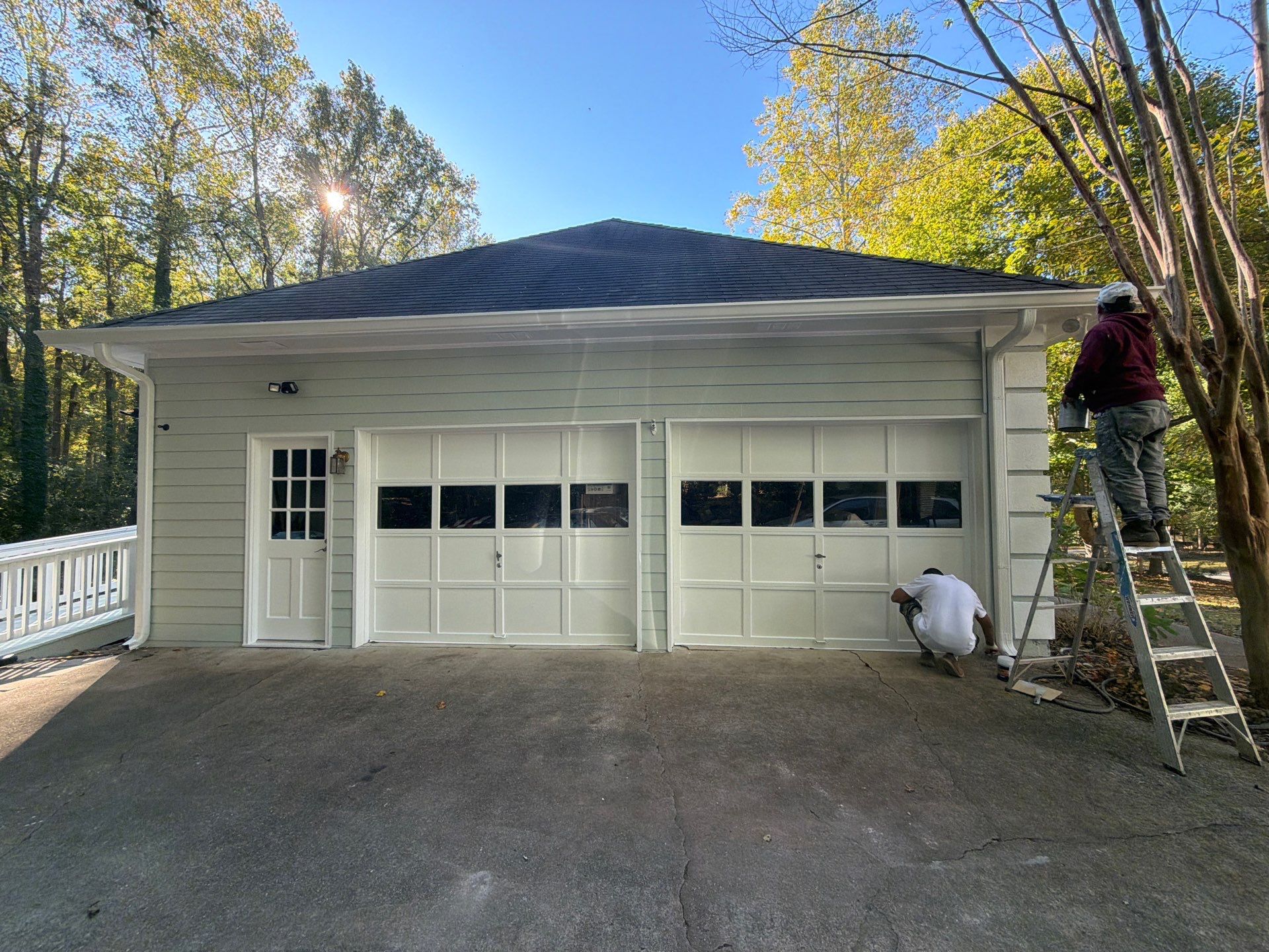 Exterior Residential Painting and Deck Refinishing in Canton, Georgia by Swift Home Renovations 