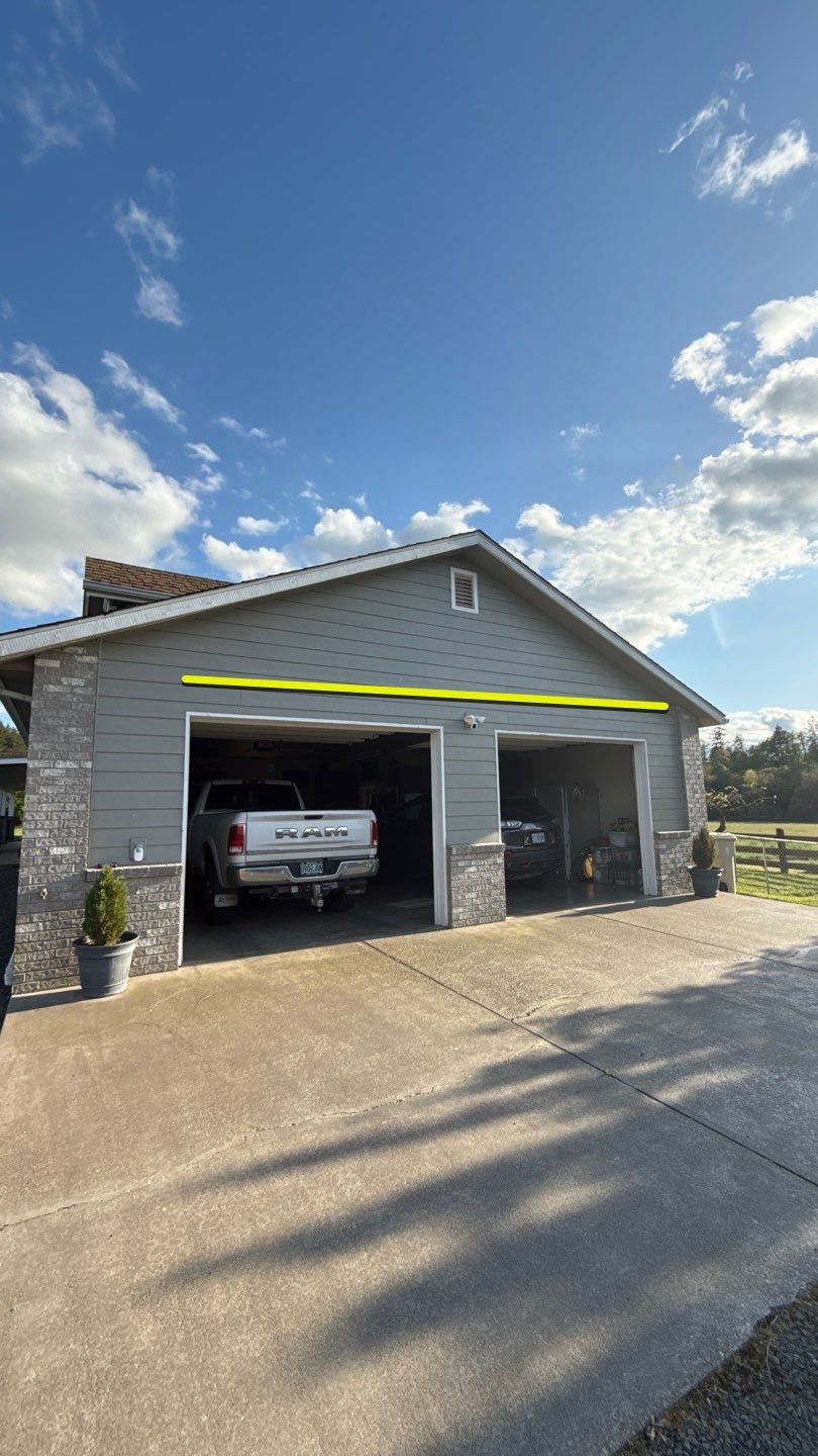 Residential Roof Replacement with Metal Accents by Orezona Building & Roofing Company, Inc.