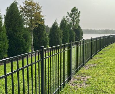 Aluminum Fence Installation using Black 3 Rail Aluminum Fence