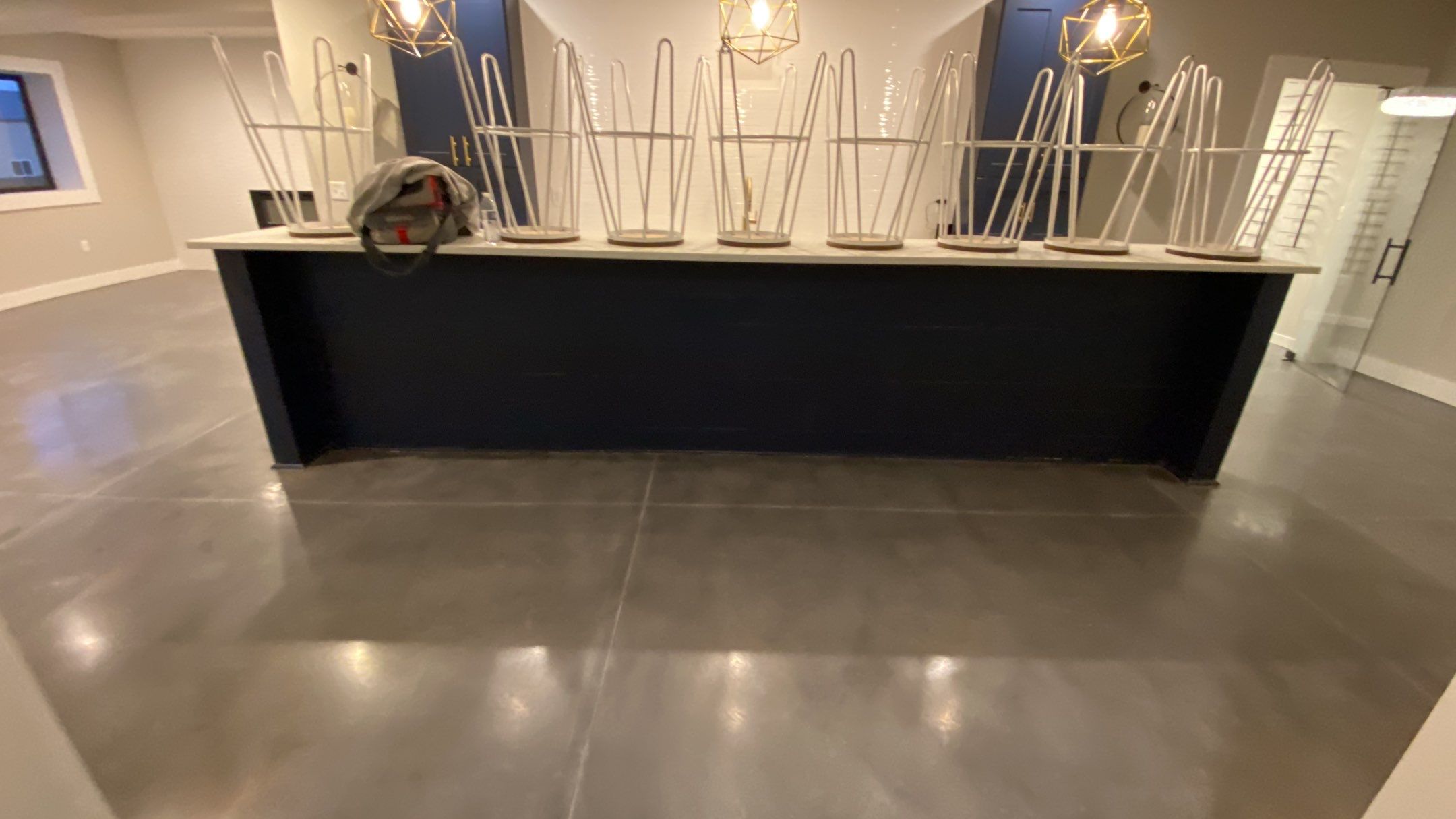 Louisburg, KS -- Basement Polish using Grey Stain by Big Red Decorative Concrete, LLC