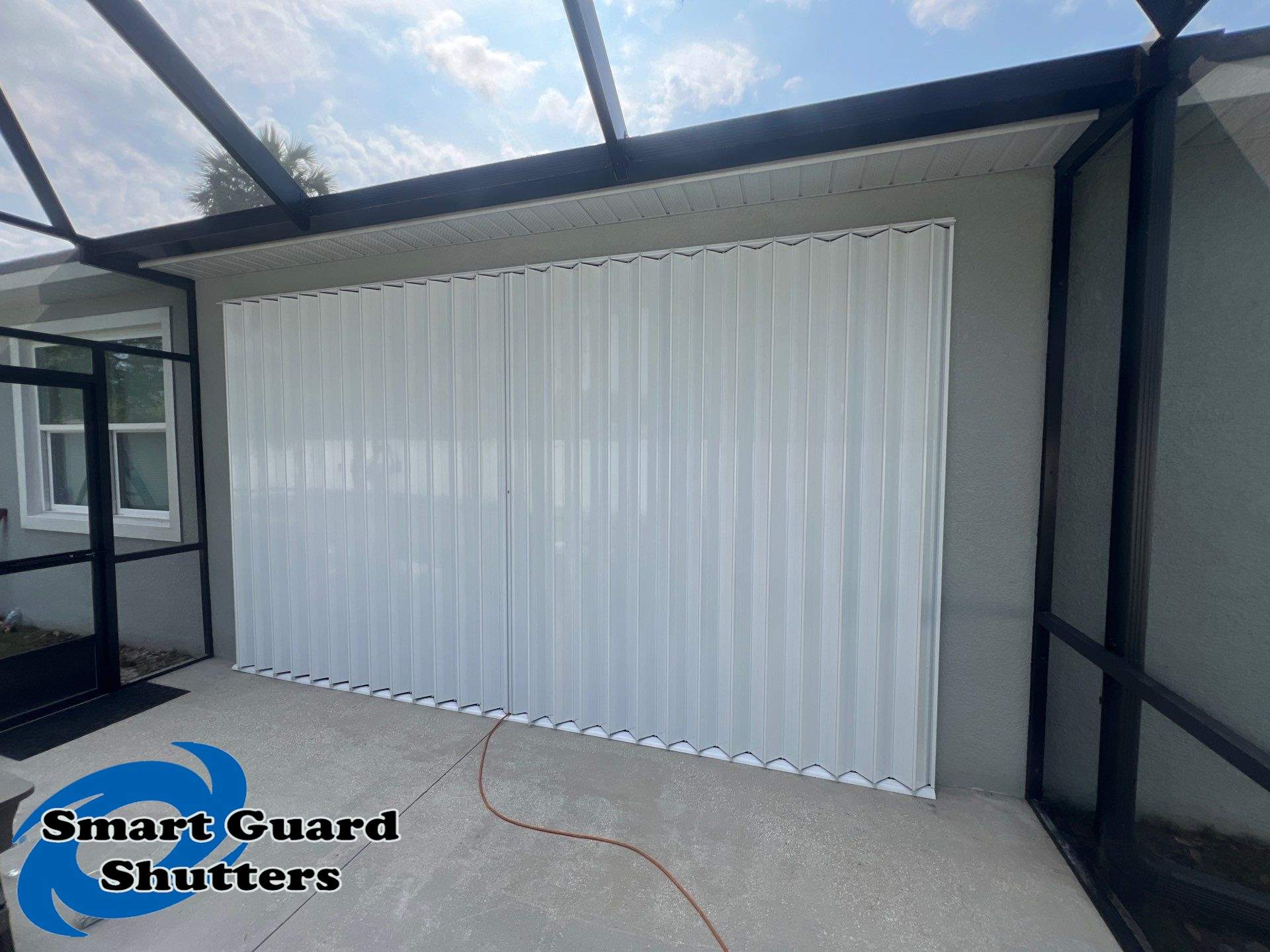 Hurricane Protection using Accordions & Rolling shutters by Smart Guard Shutters