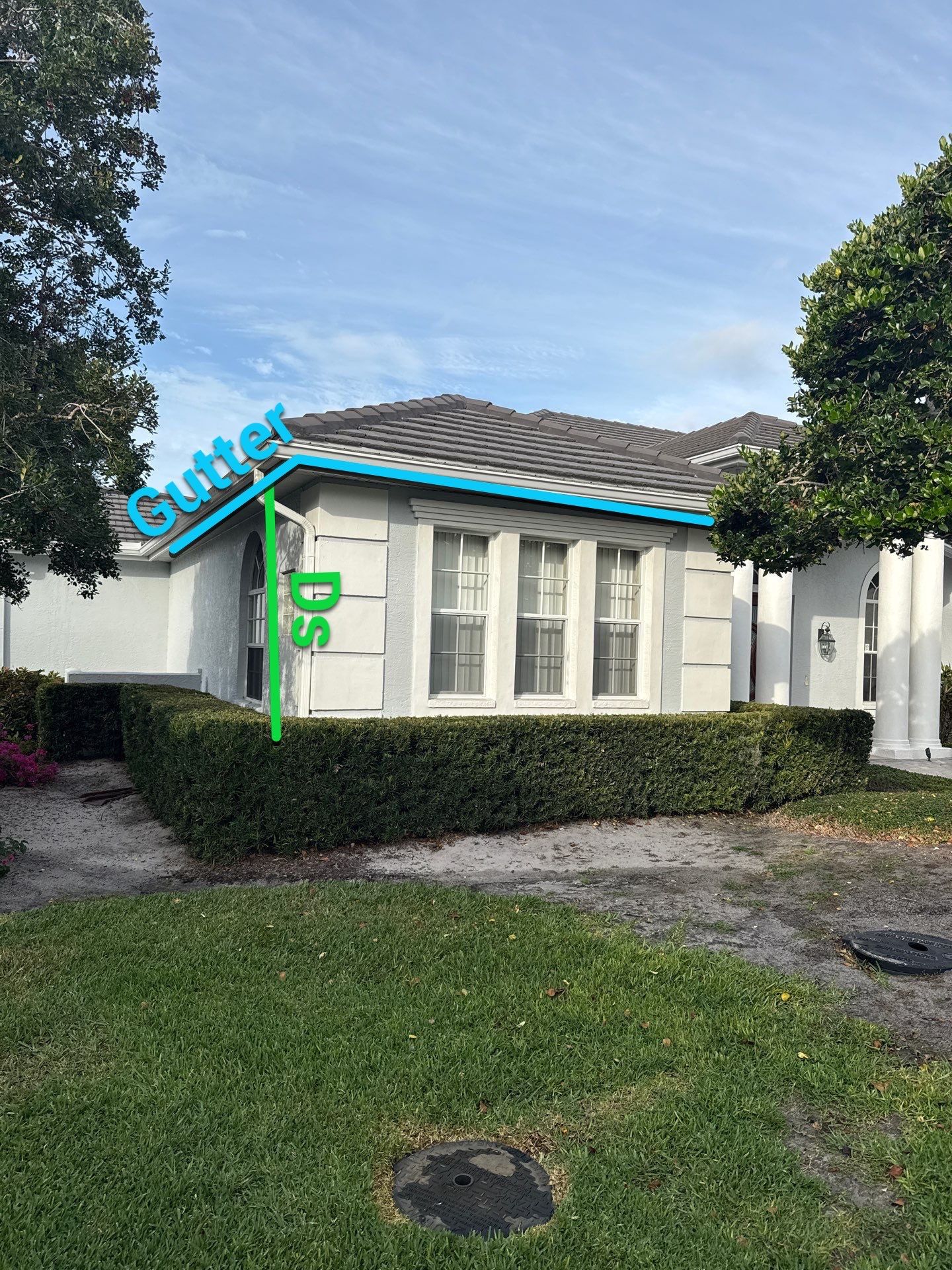 White Down Spouts using downspouts and White Seamless Gutters in Sarasota FL by Gutter Professors