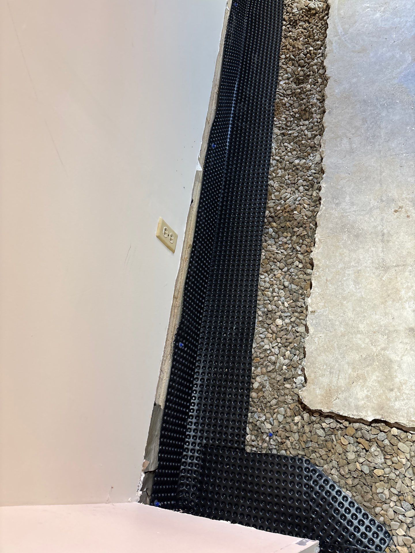 Completing the Connection for Lisa's Drain Tile System by Waterproofing Northeast