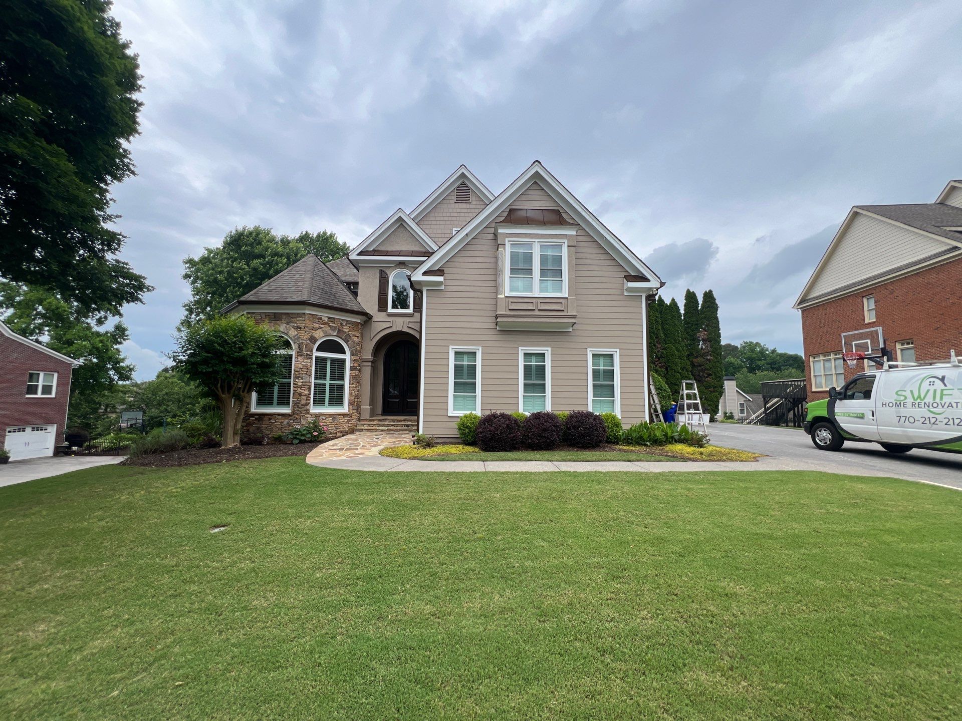 Full Exterior Siding Replacement and Stone Veneer Installation in Roswell by Swift Home Renovations