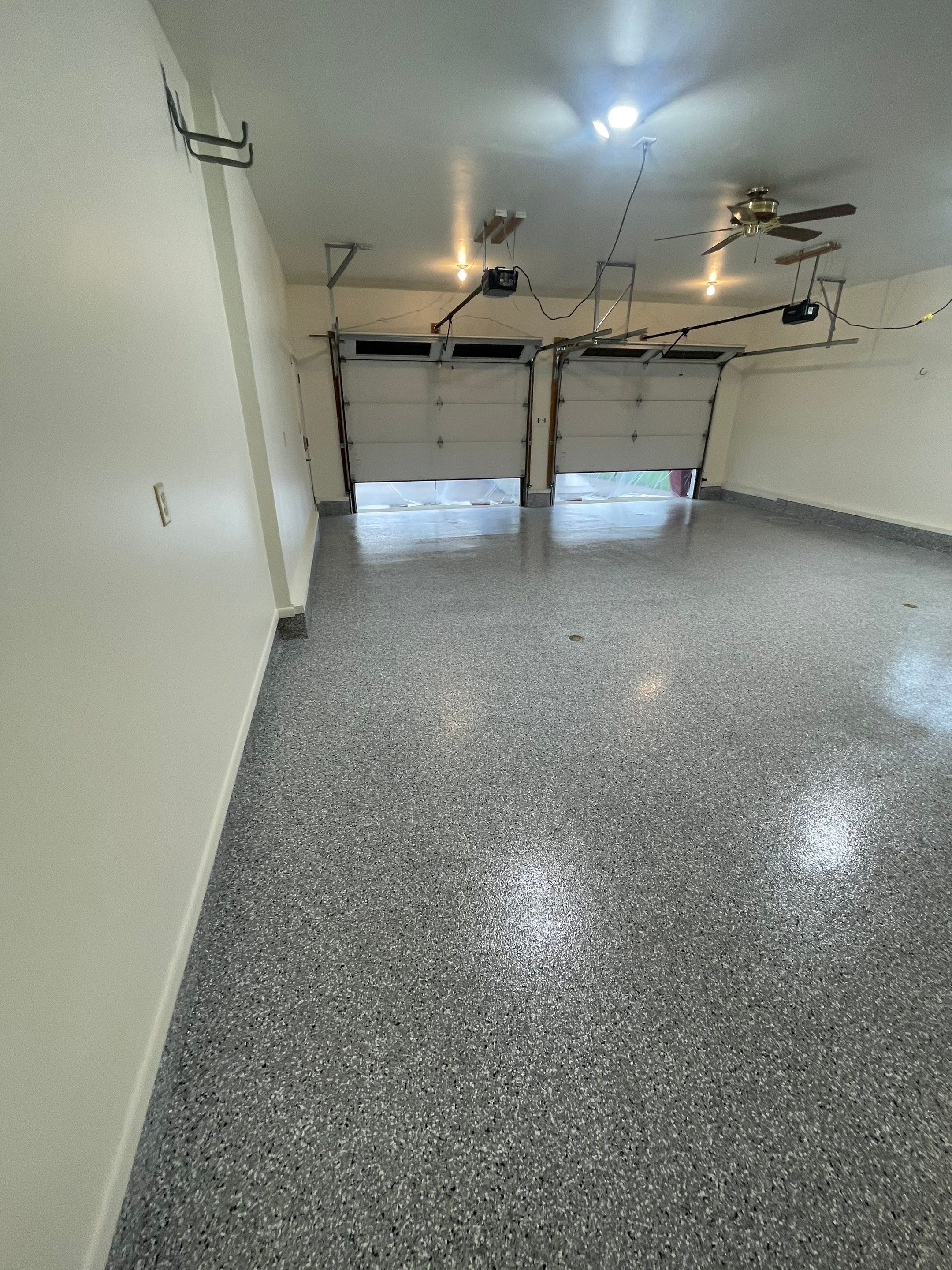 Madison Garage Concrete Coating with Feather Grey Speckle Finish by Select Painting, Coatings & Garage Cabinets