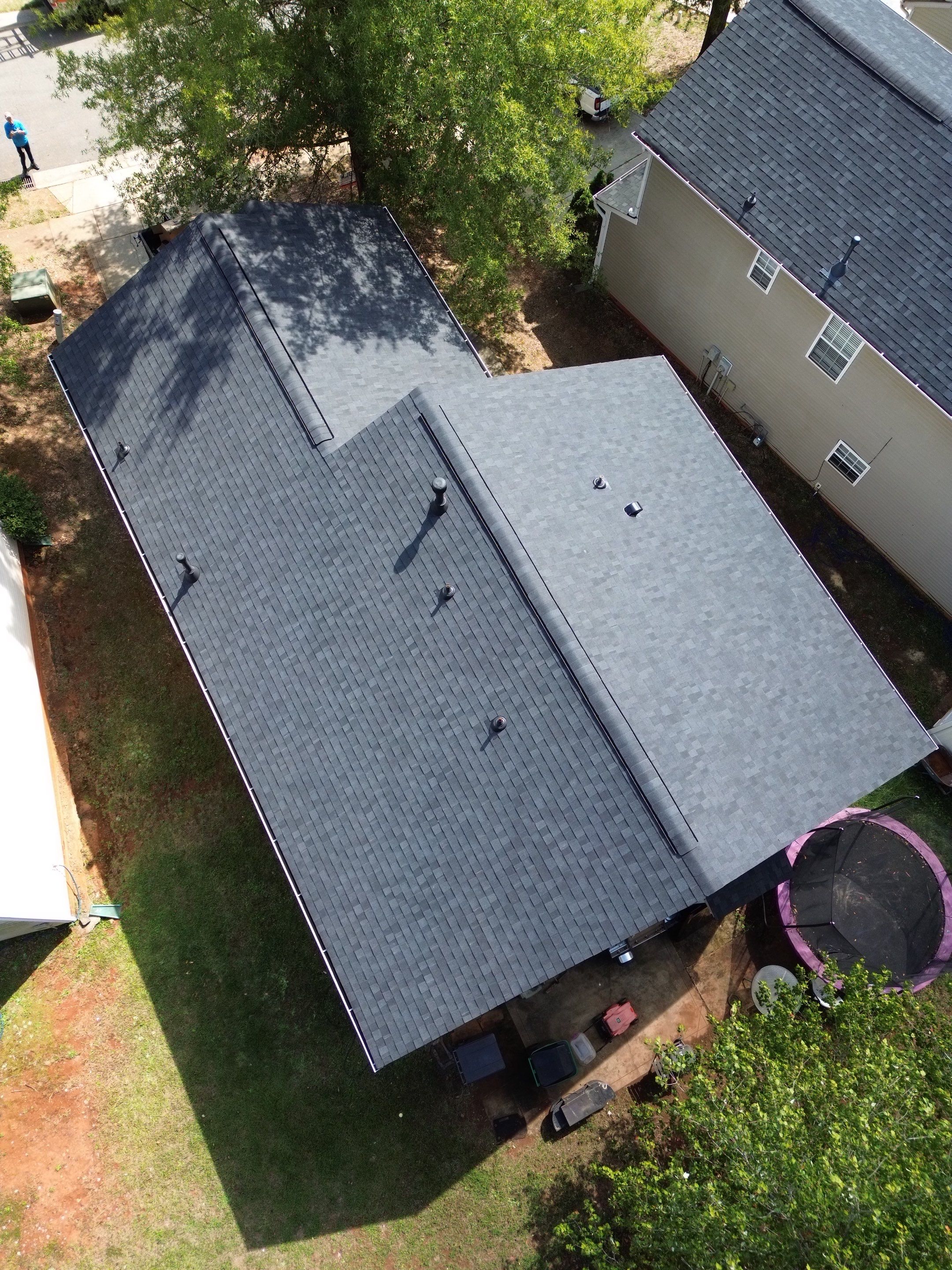 Roof and gutter replacement by hail and wind damage by Just Brilliant Restoration JBR