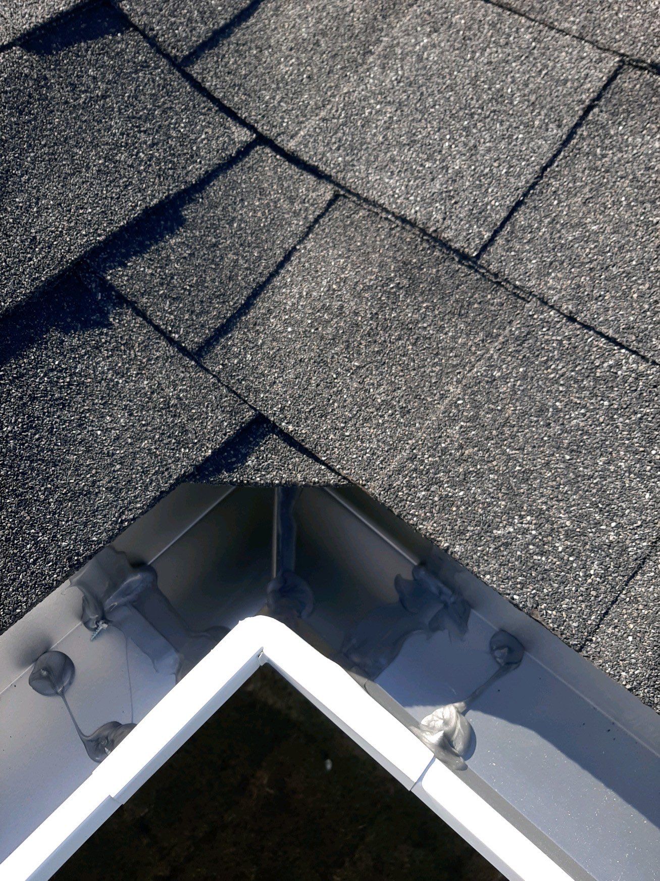 Seamless Gutter Installation Using White K-Style Gutters by Gutter Professors