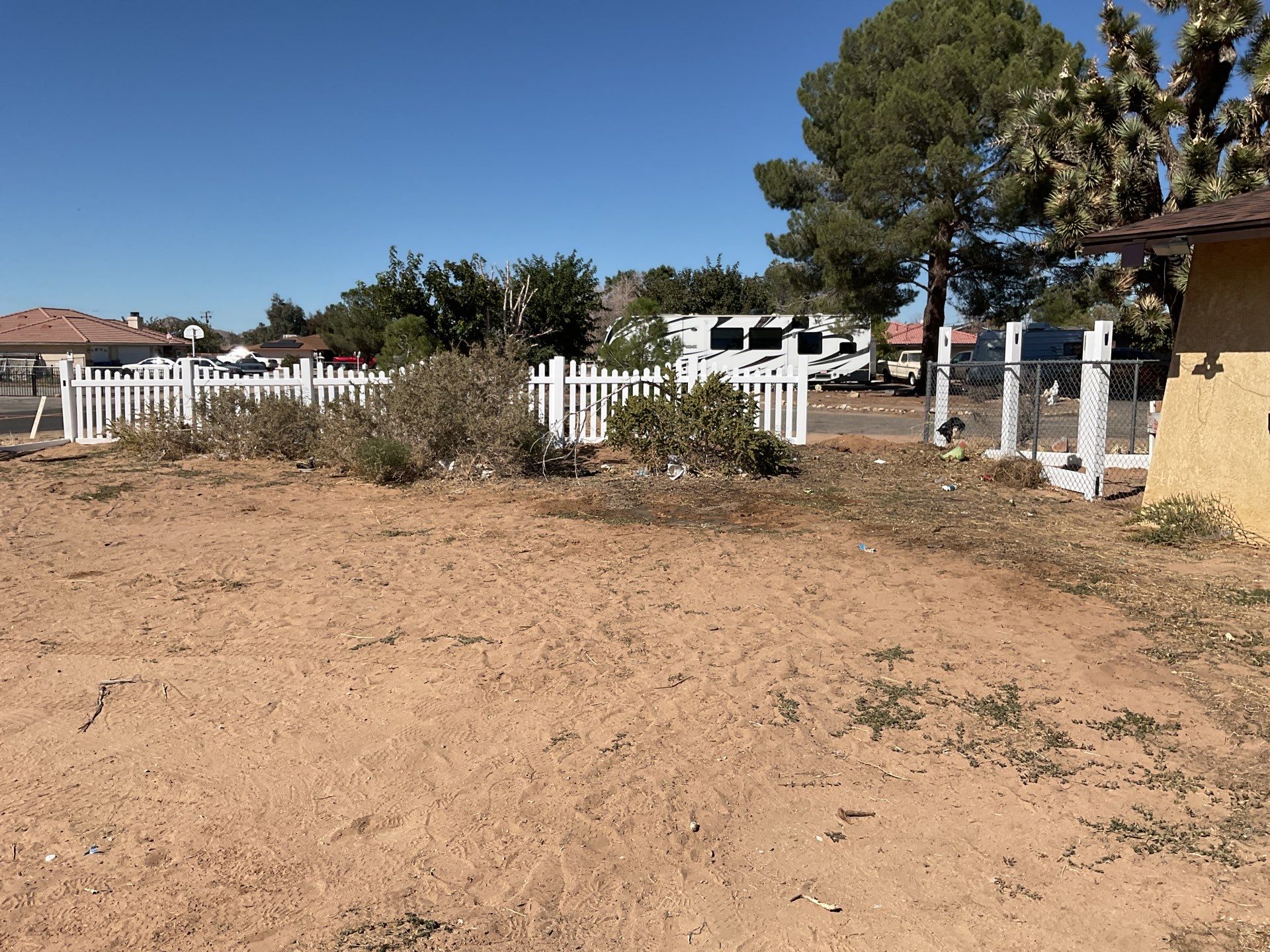 White picket fence  by Fence Guys Inc. 