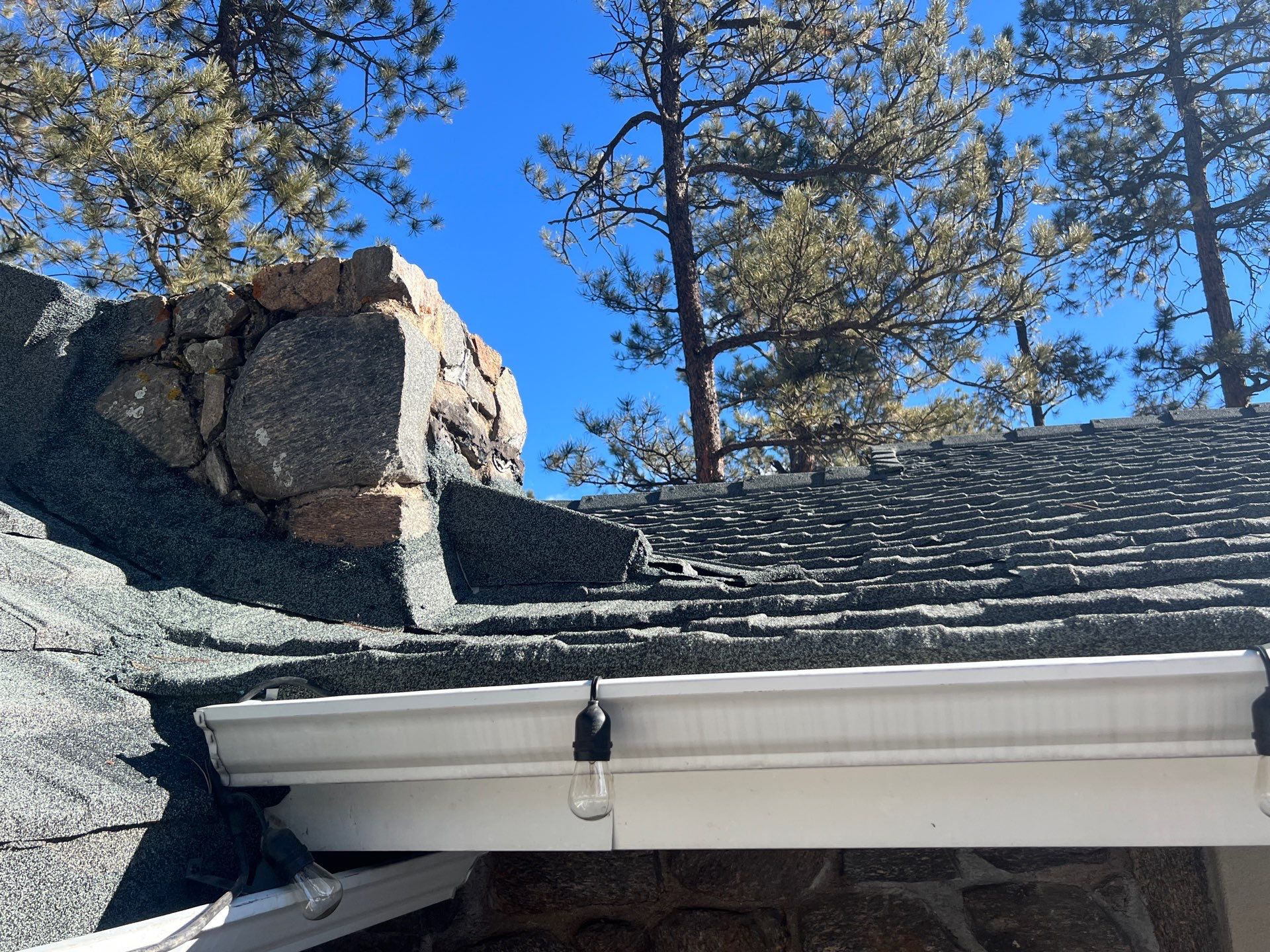 Residential Roofing Installation using Stone Coated Steel by Blue Peaks Roofing LLC 