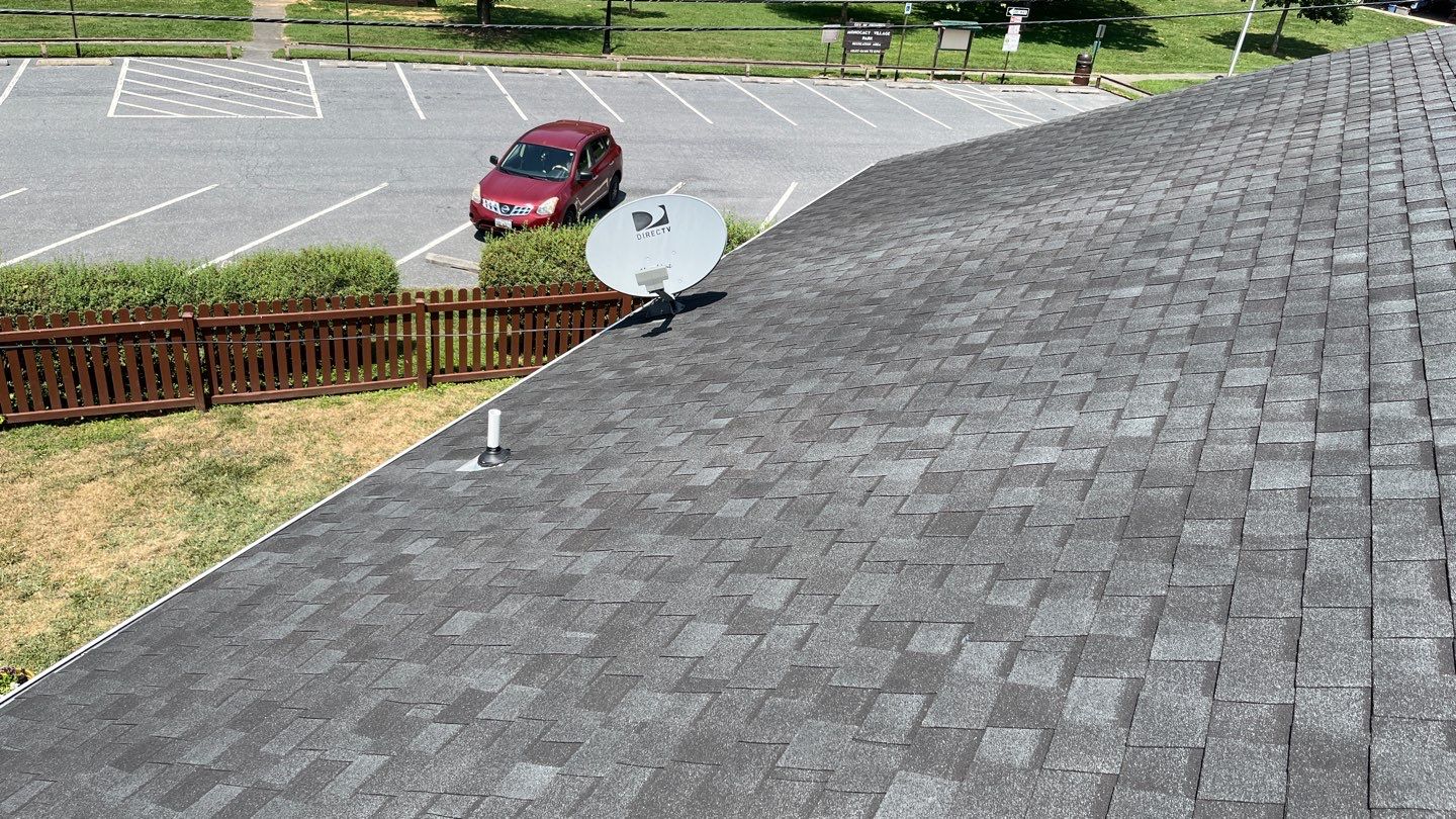 Residential Roofing Installation using Atlas Pinnacle Pristine Black Architectural Shingles by Frederick Roof Repair
