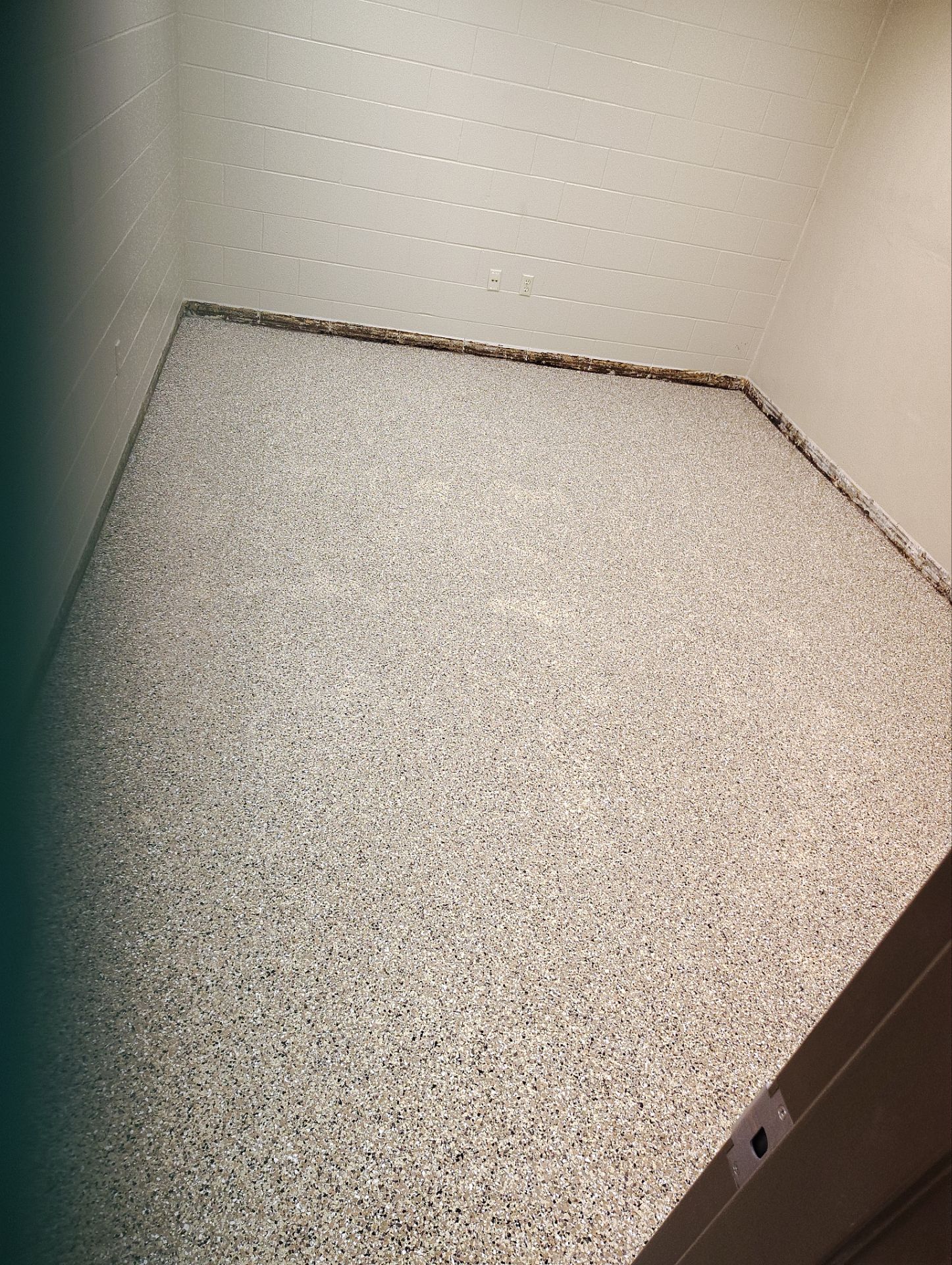 Industrial Flake Epoxy Floor Installation at Pierre National Guard Facility by Select Painting, Coatings & Garage Cabinets
