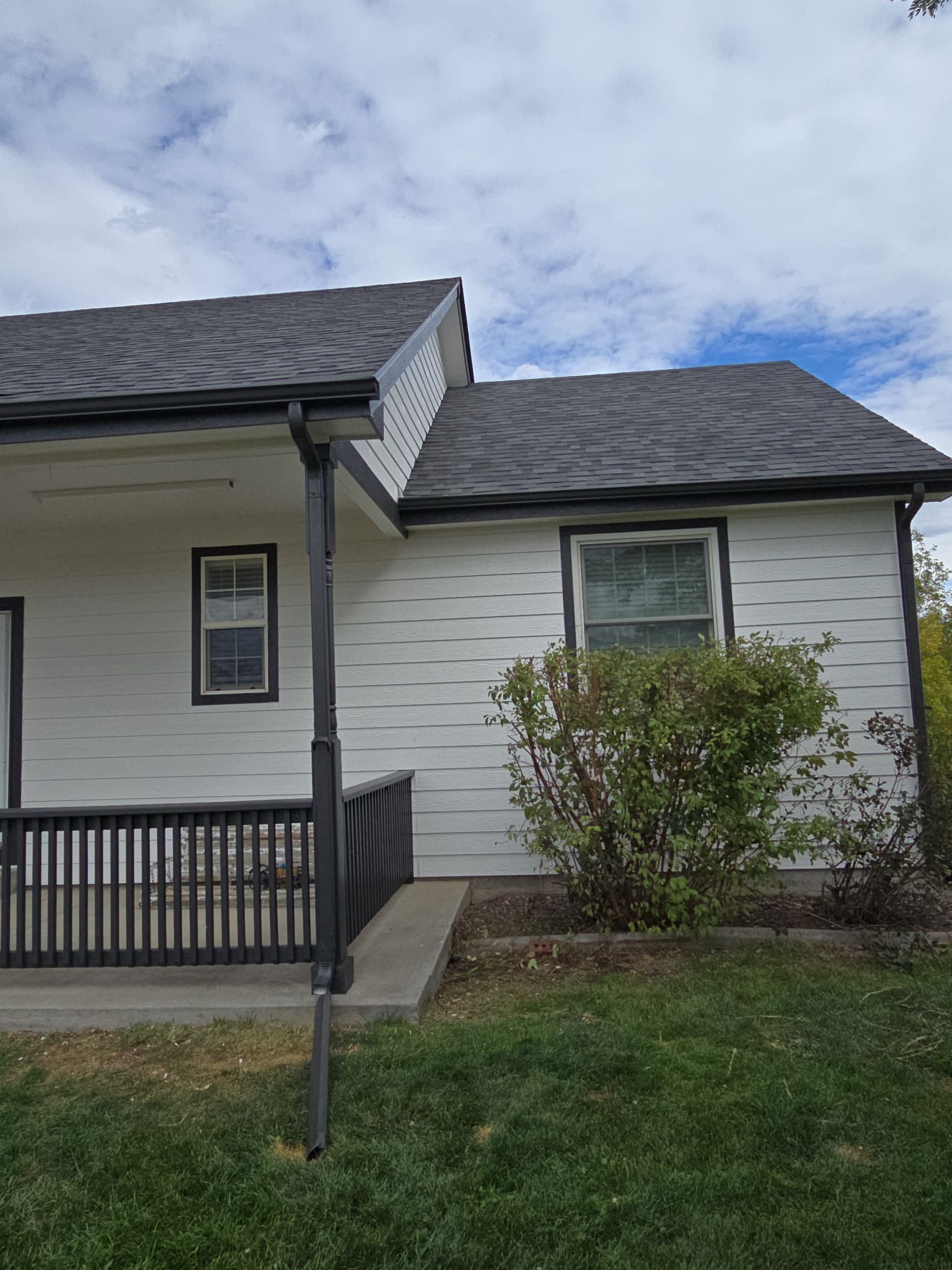 From Faded to Timeless: White & Black Exterior Renewal by J&M Painting LLC