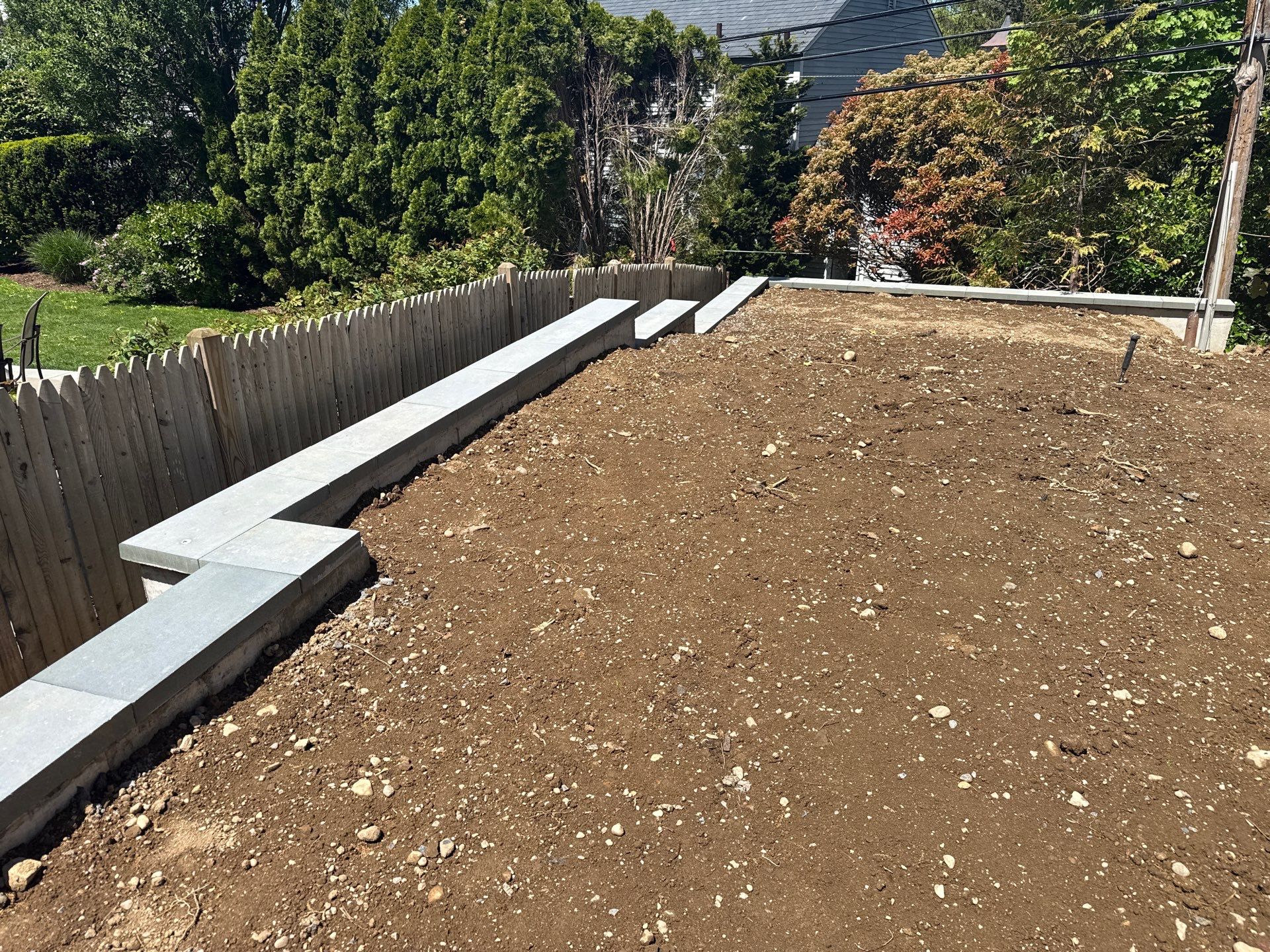 Concrete Retaining Wall Construction in Port Washington by Medina Design & Development Group