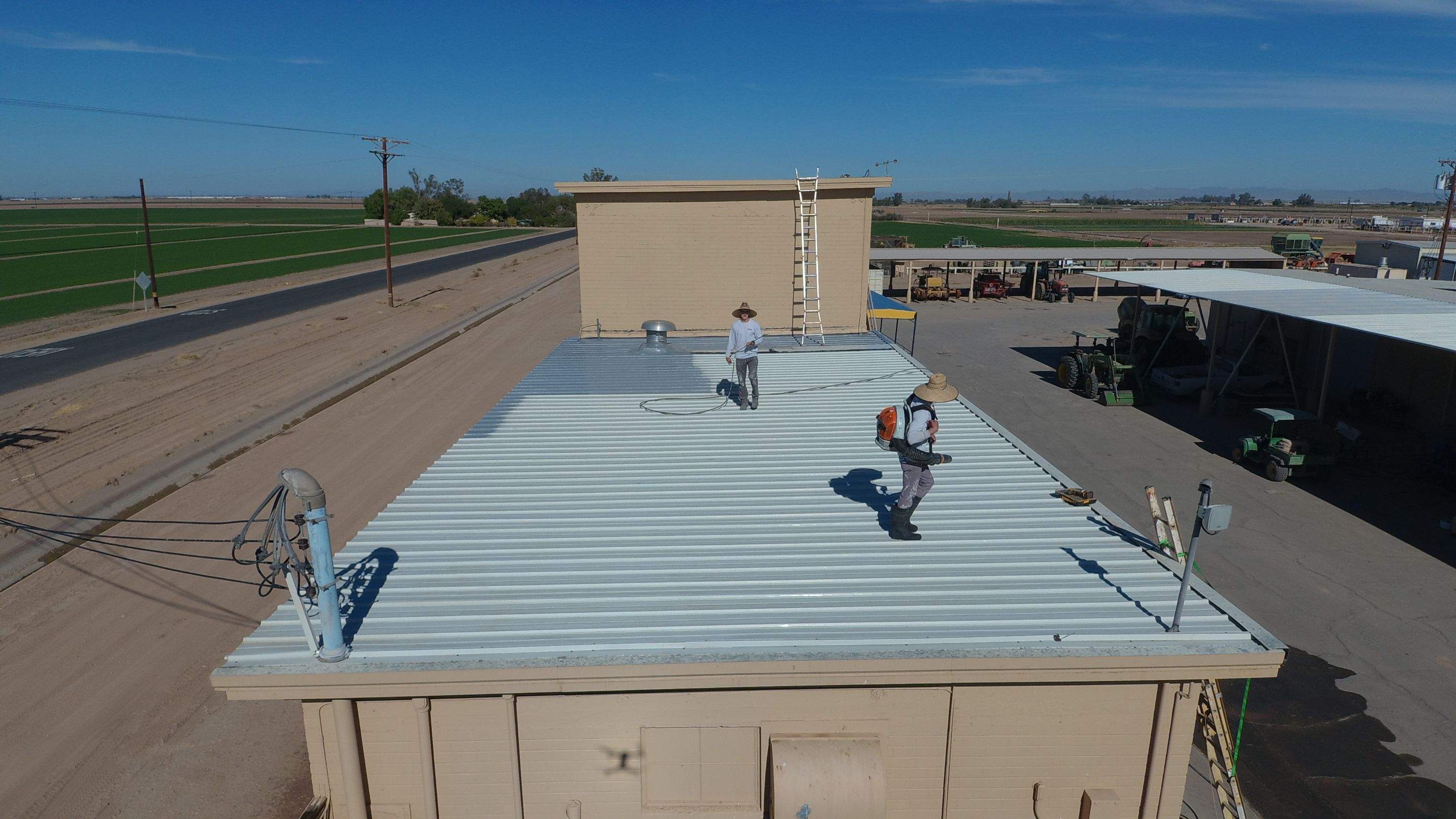 Metal roof restoration on commercial roof using Conklin Benchmark/PUMA XL fabric and coating by Straight Edge Roofing Inc