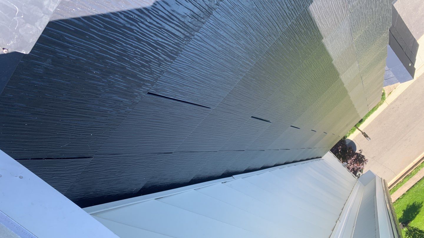 Tesla Solar Roof Replacement using Tesla Solar Roof V3 tiles by American Home Contractors
