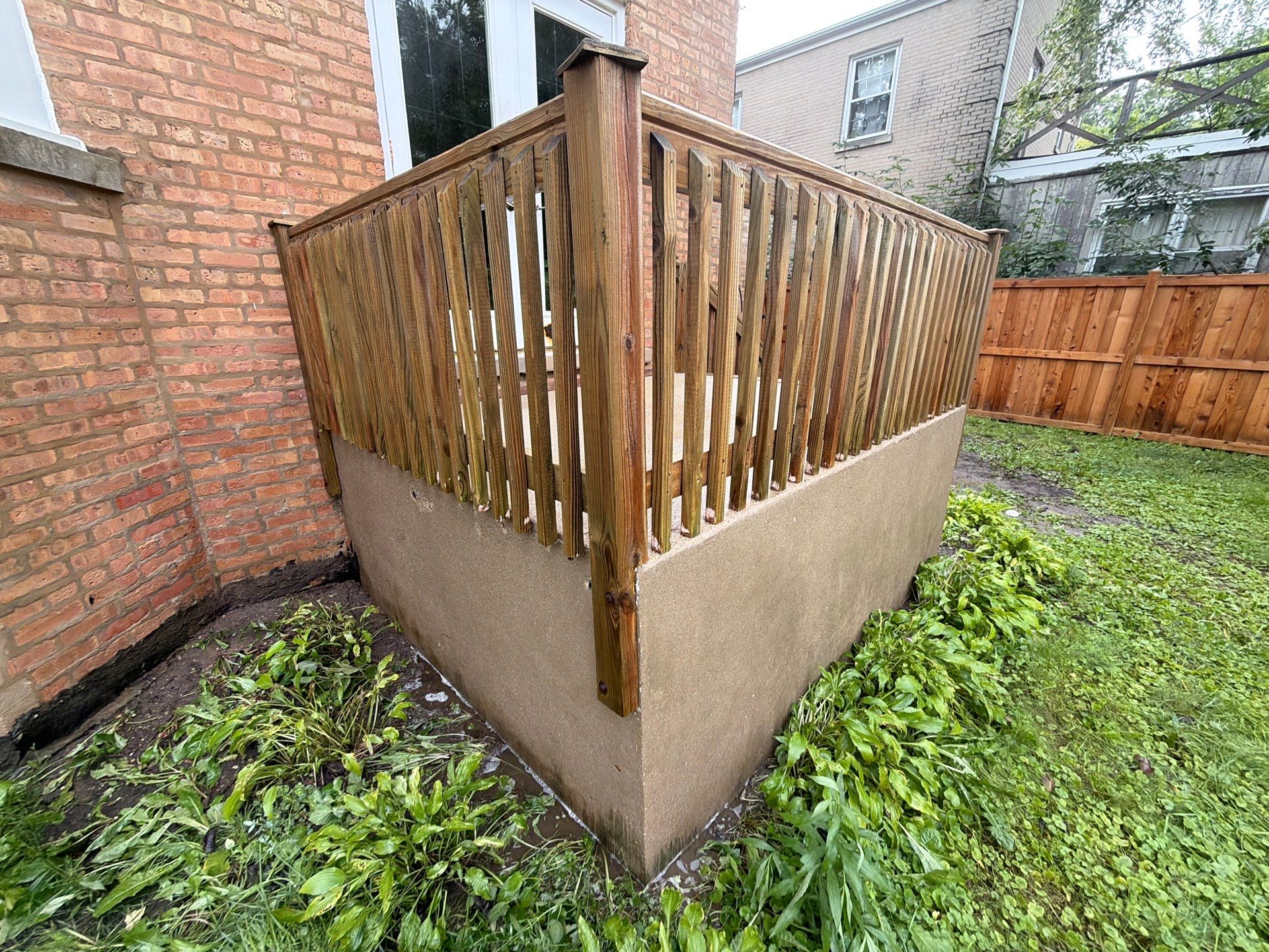 Wood fence cleaning and sealing by Northern Power Washing LLC.