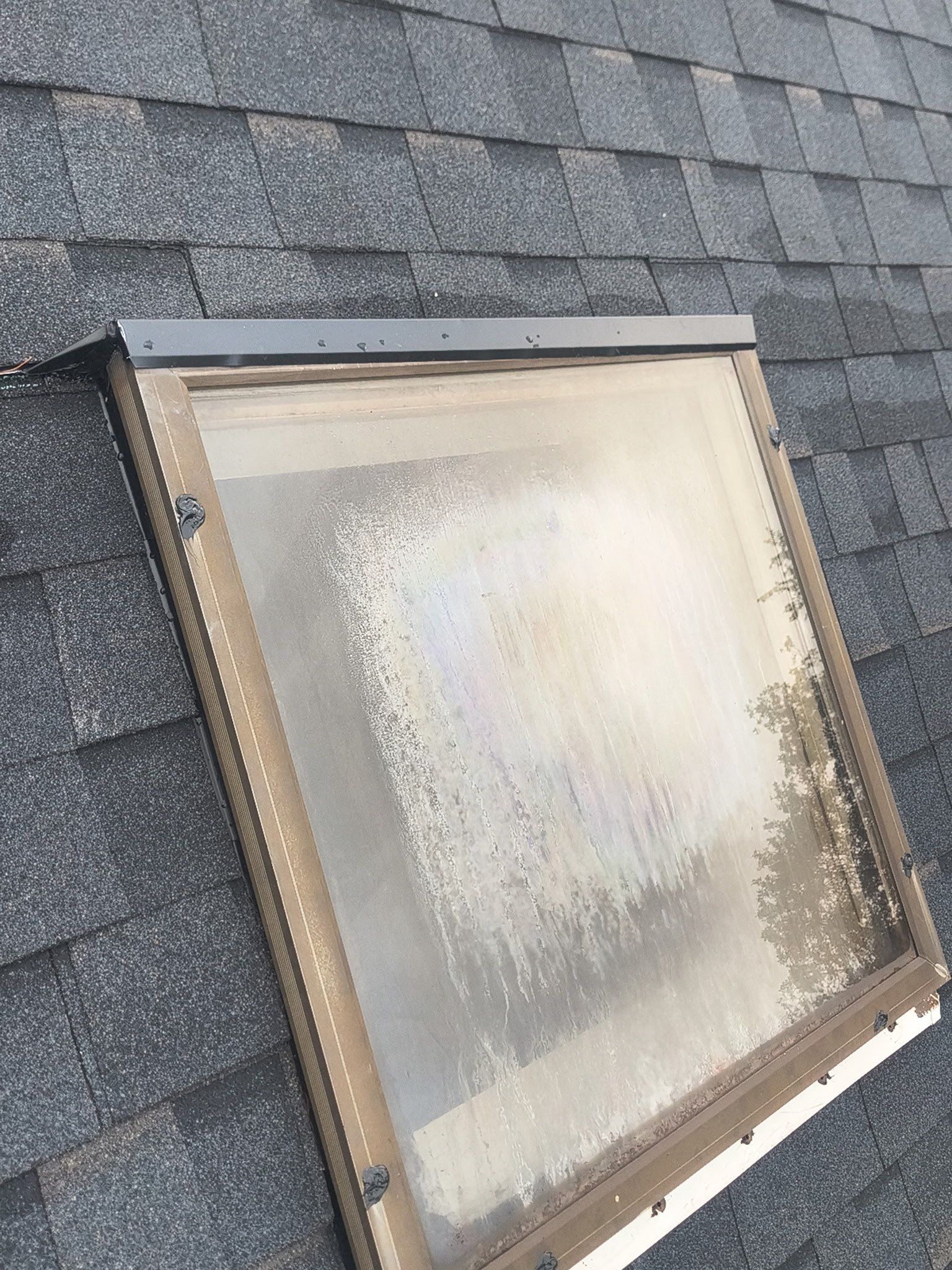 Roof Replacement with New Skylight by Homestyle in Solon by Homestyle Home Improvements (HHI)