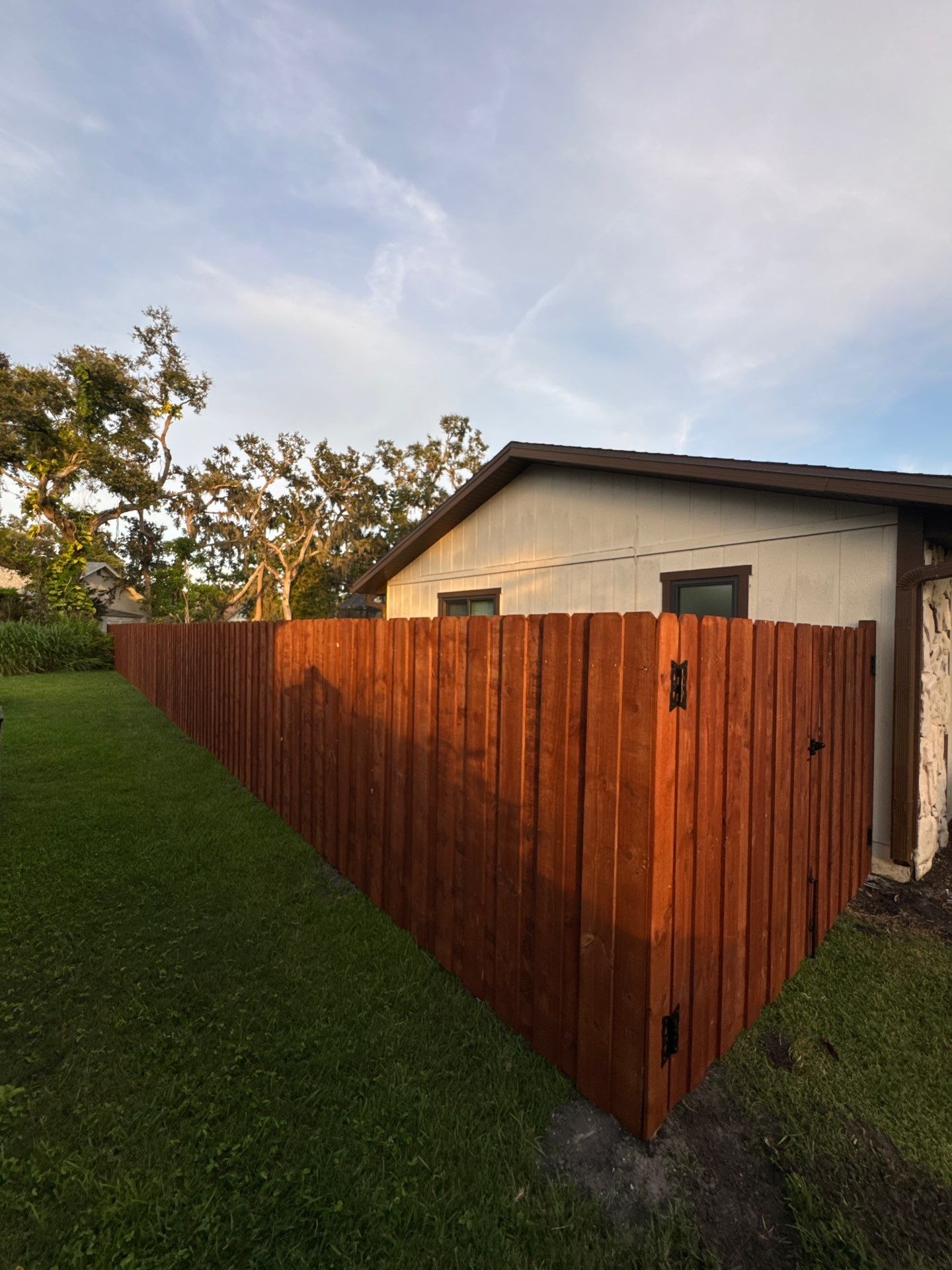 Wood Fence Installation using Pre-stained Pine Board On Board by Asap fence and gates, LLC