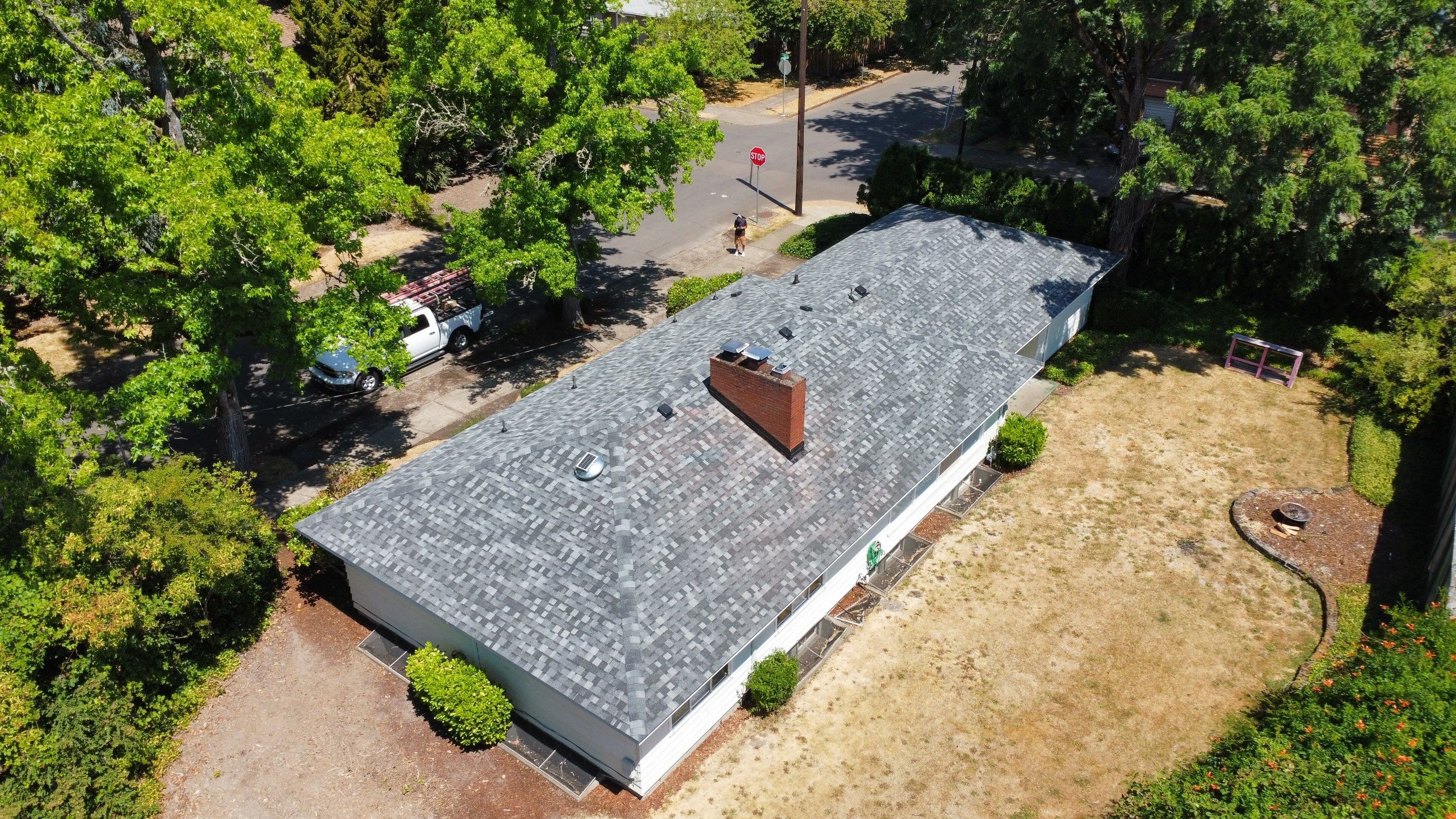 Residential Roofing Installation using IKO Dynasty (Color: Summit Grey) by Orezona Building & Roofing Company, Inc.
