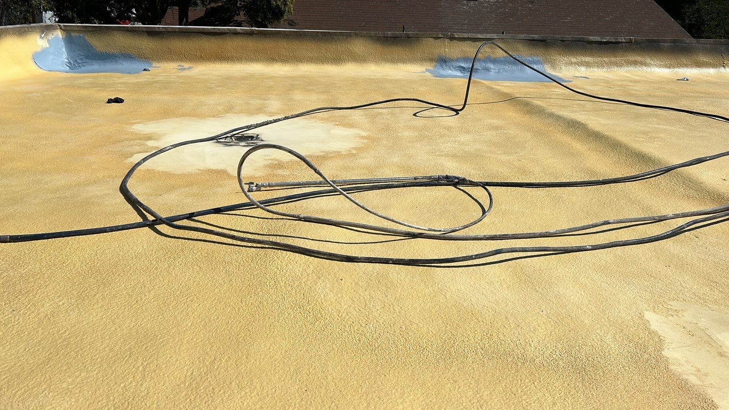 Foam Refurbish using Conklin Benchmark/PUMA XL coatings and spray foam; Also metal roofing around parapet wall by Straight Edge Roofing Inc