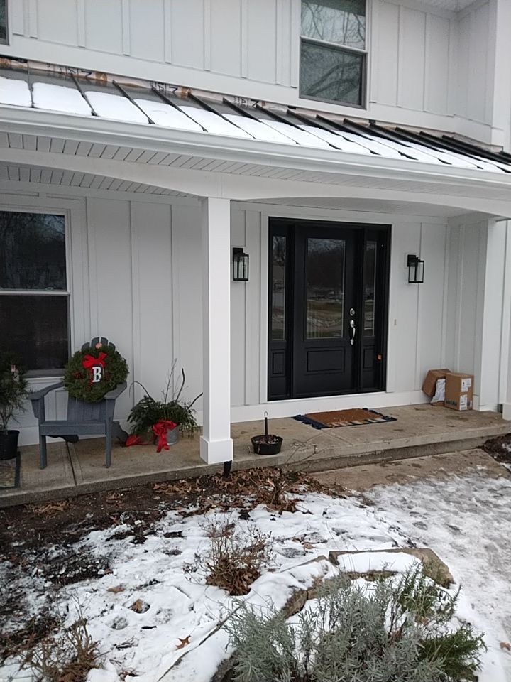 James Hardie Siding  using James Hardie Board and Batten, White by Absolute Roofing and Construction