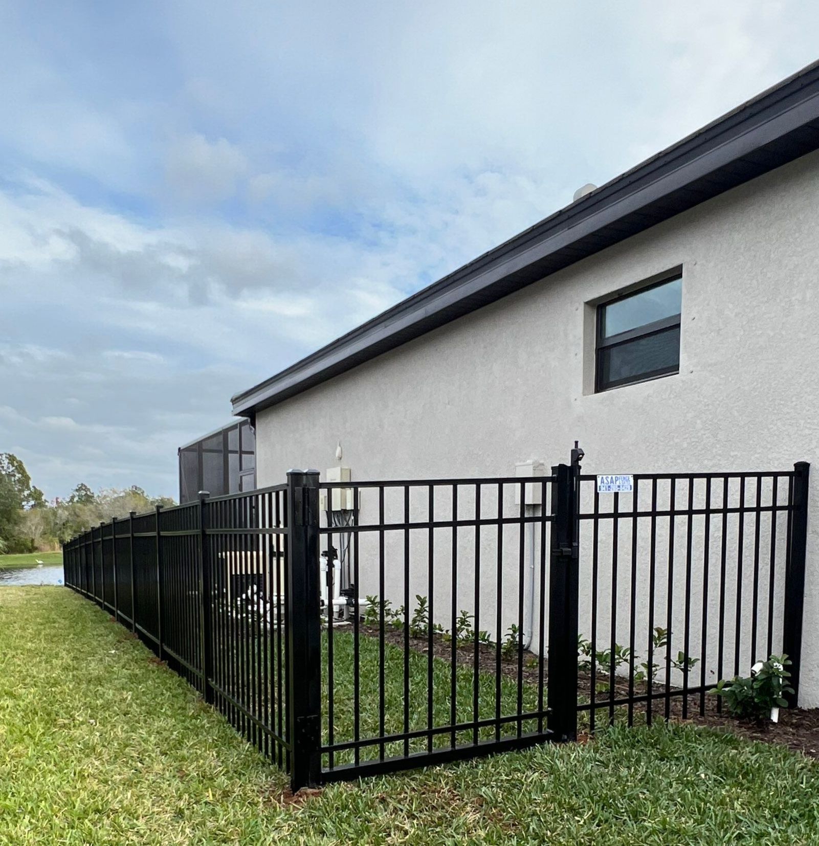 Aluminum Fence Installation using Black 3 Rail Aluminum Fence by Asap fence and gates, LLC