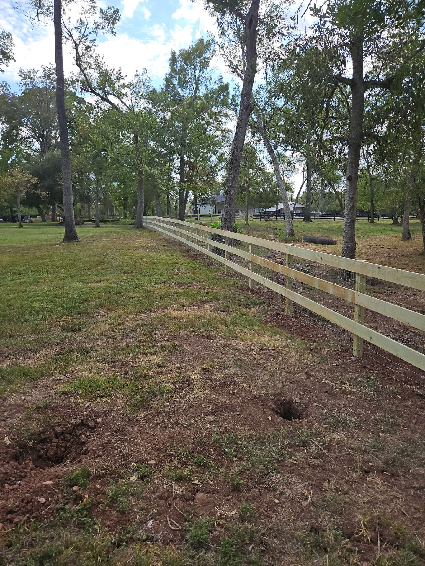 Ranch Style fence Plus Iron installation by Tim's Fences