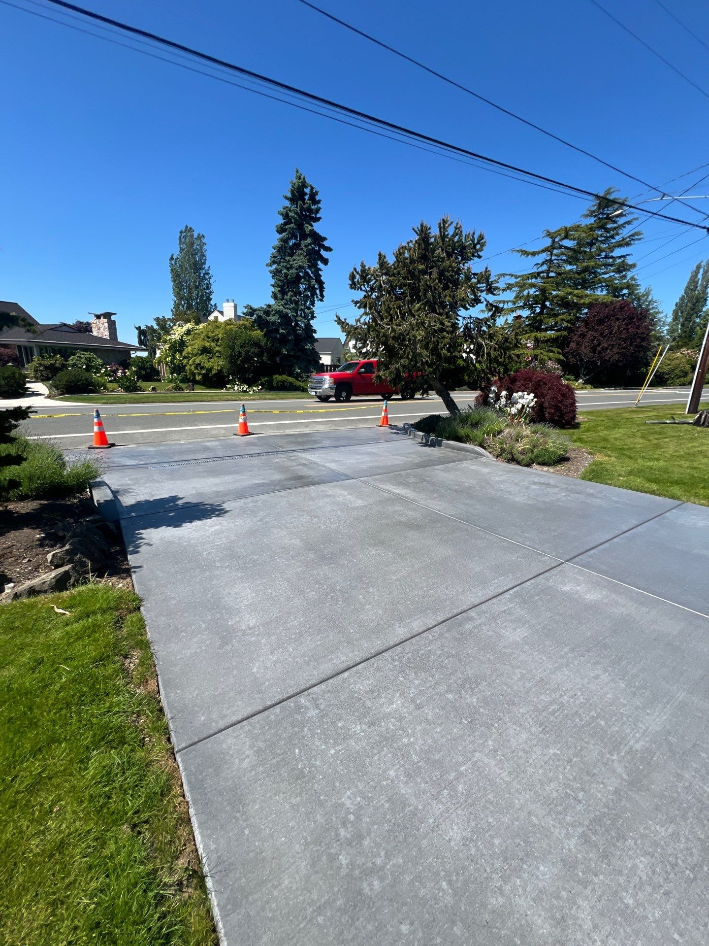 Colored Concrete Driveway Repair with Sealer| Everett    by Jireh Asphalt & Concrete Inc 