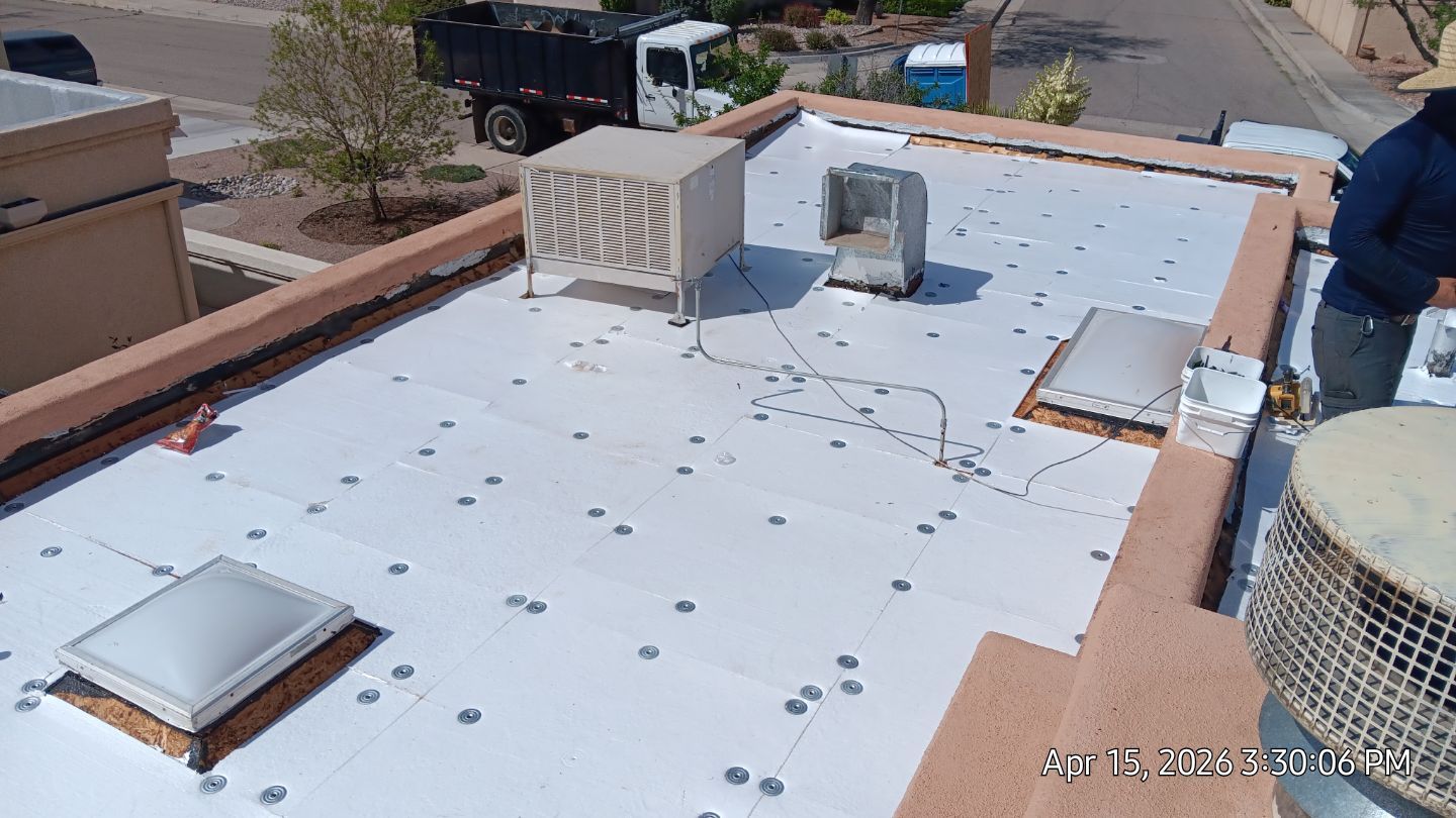 Residential TPO Flat Roof Replacement and Skylight Installation in Albuquerque by Doyle Roof Masters Inc