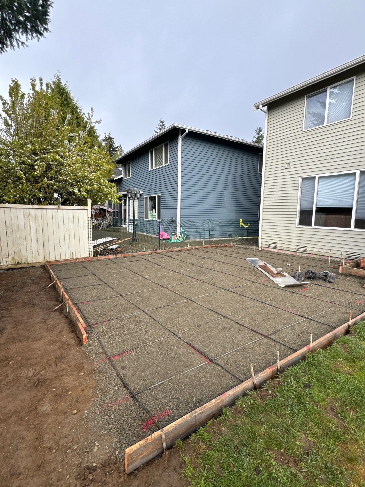 Benedict | Stamped Concrete Back Patio by Jireh Asphalt & Concrete Inc 