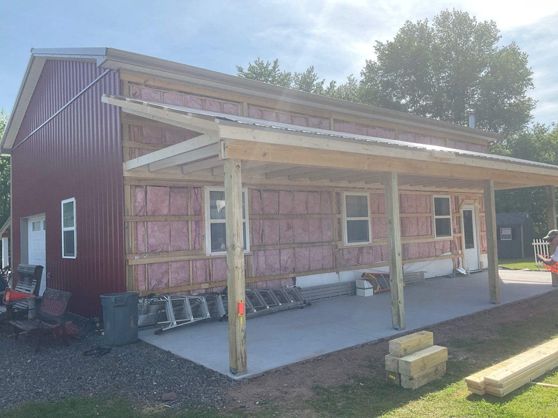 Covered Concrete Porch Addition and Exterior Door Installation in Tower City by Esh Builders