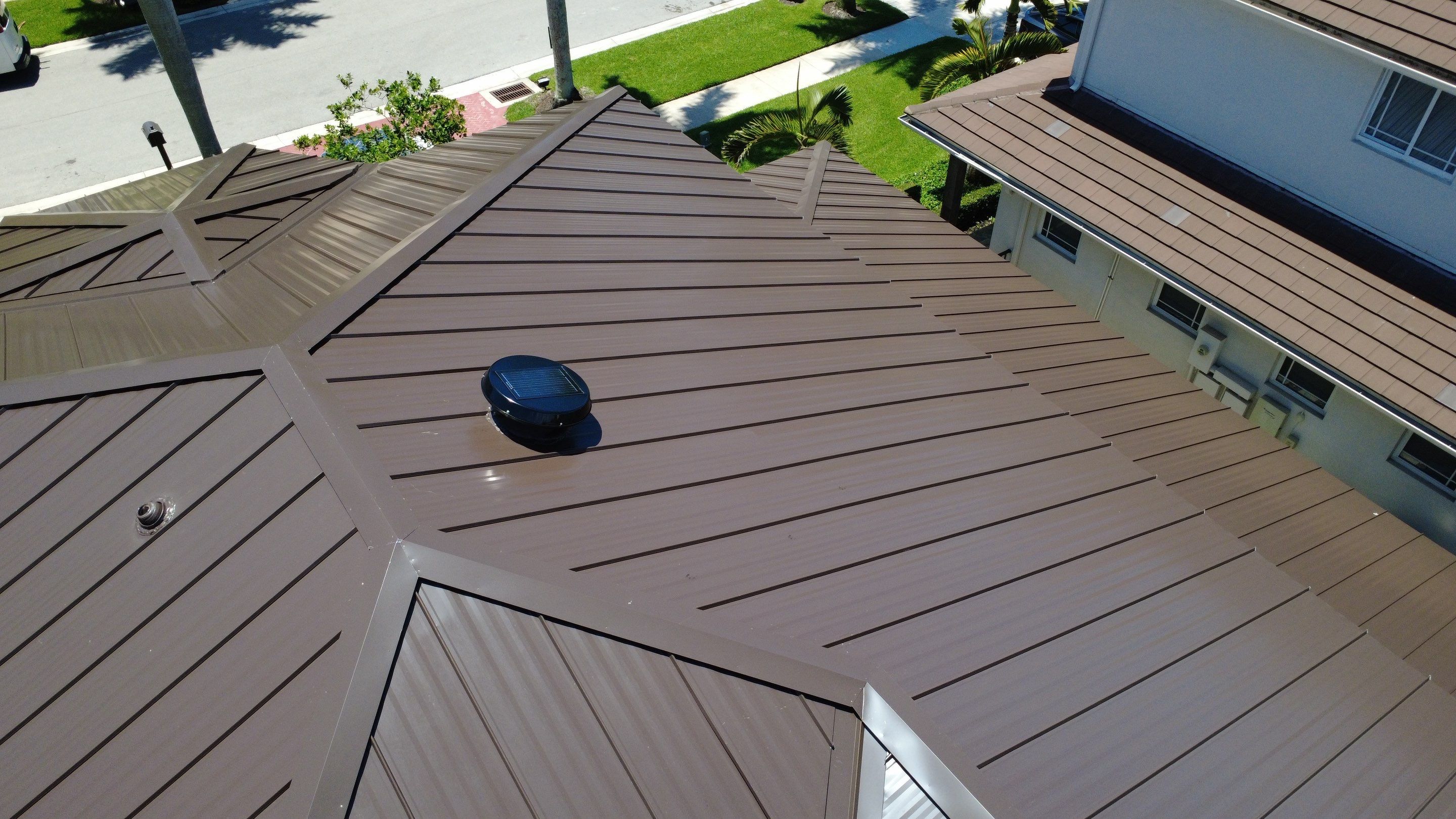 Residential Roofing Installation using 1" Nail strip metal roof by BLUES BROTHERS ROOFING