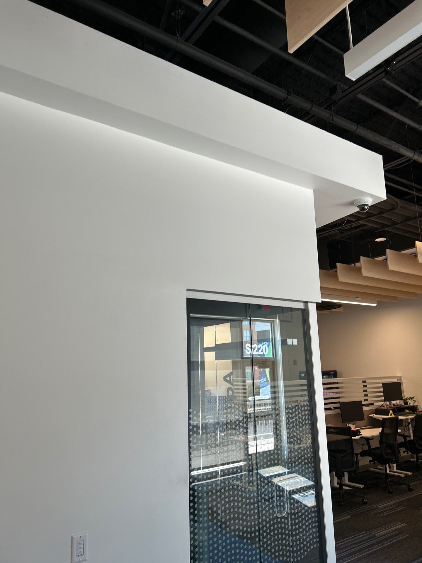 Office Remodel Featuring Acoustic Baffles and Professional Carpet Installation by CompanyCam Sales Demo