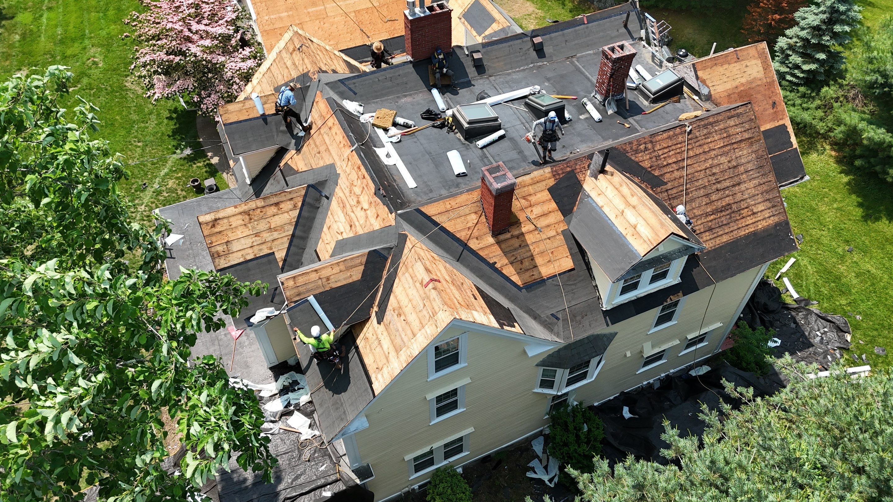 Full Roof Replacement & EPDM Restoration – North Andover, MA by Mighty Dog Roofing of Greater Middlesex County