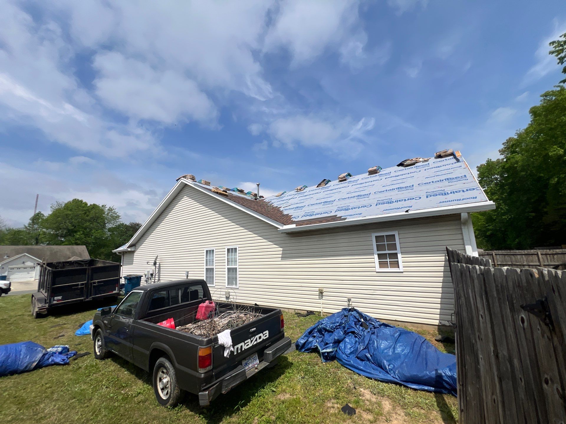 Burlington Residential Roof Replacement with Brown Architectural Shingles by The Remodeling Company