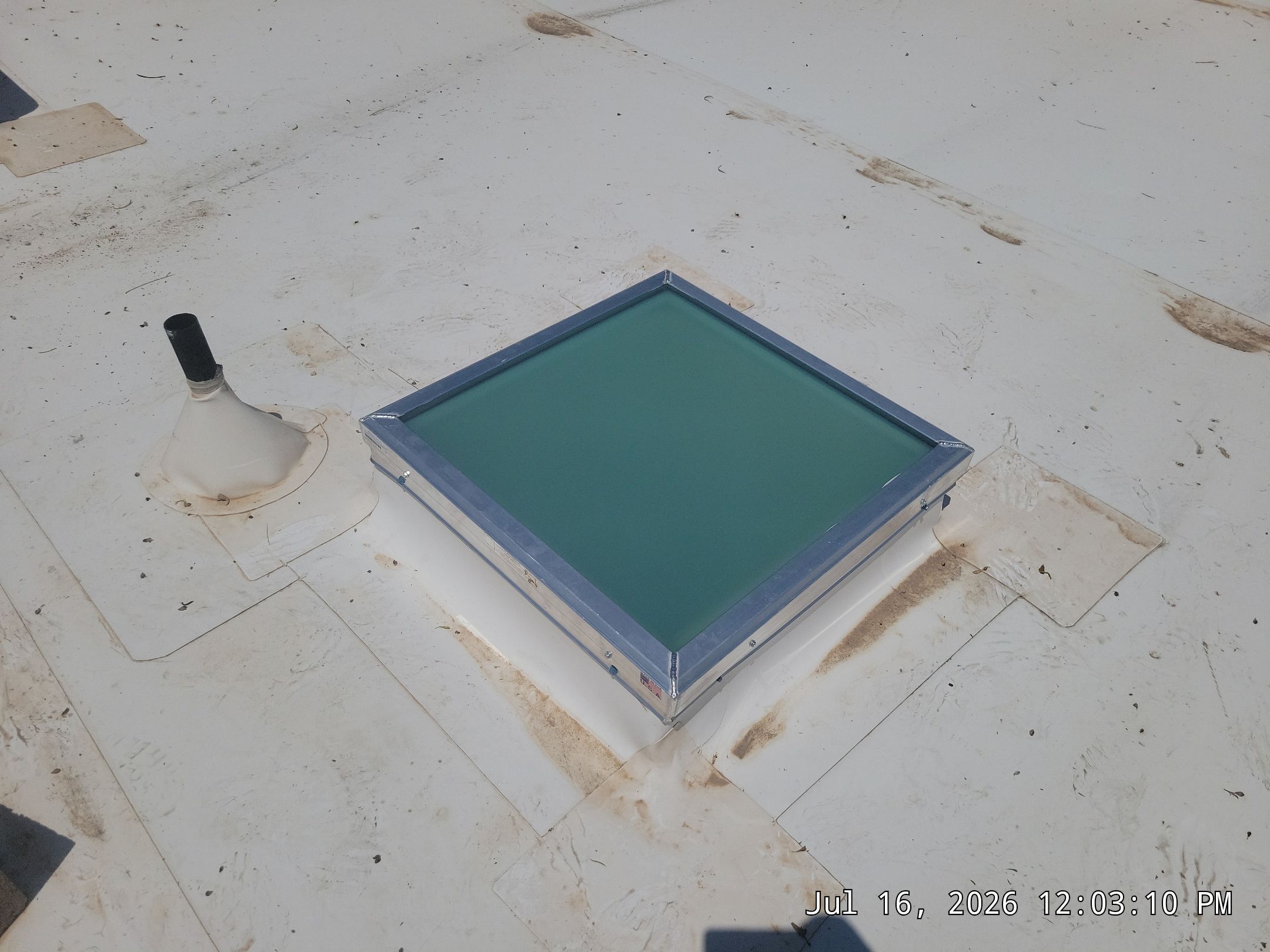 Low-e Glass Skylight Installation in Rio Rancho by Doyle Roof Masters Inc