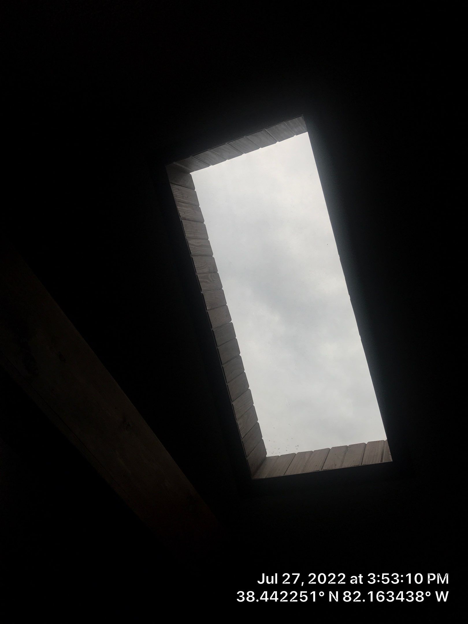 Shingle Roofing with Velux Skylight replacement and stone chimney flashing  by Secure Construction Company Inc