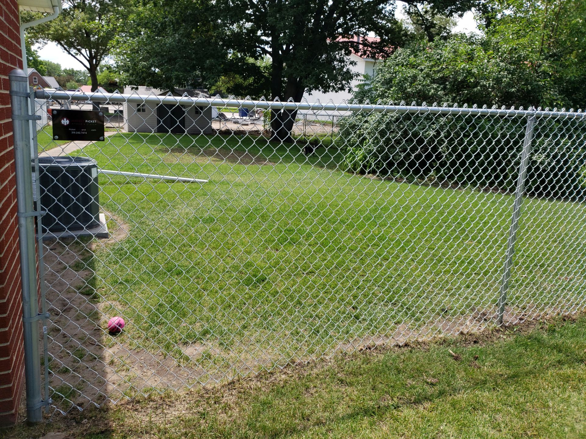 Residential Chain Link Fence and Gate Installation in Washburn by Perfect Picket Fence and Stain