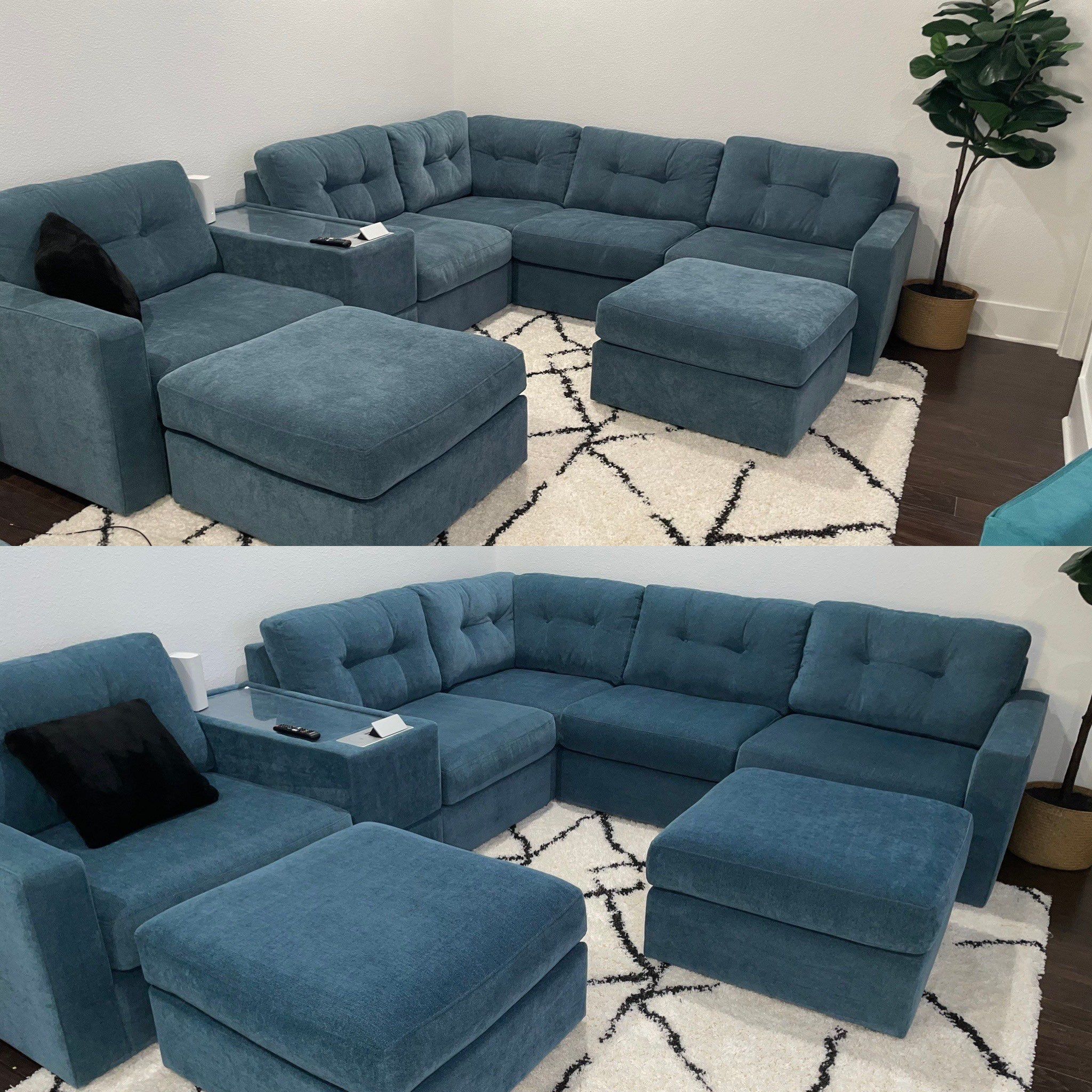 a carpet cleaning company is cleaning a white and black patterned area rug in a living room