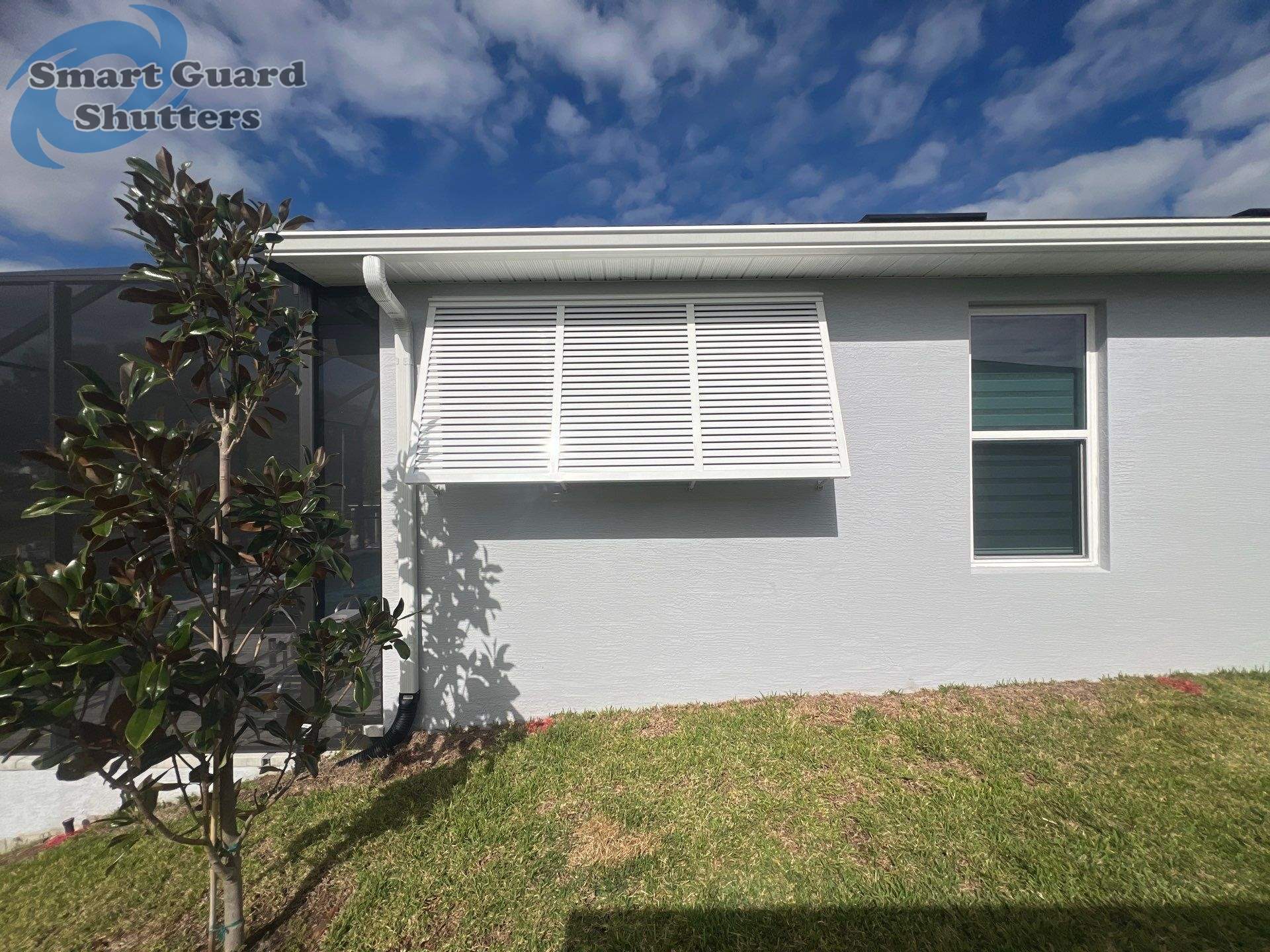 Decorative Bahamas in Signal White by Smart Guard Shutters