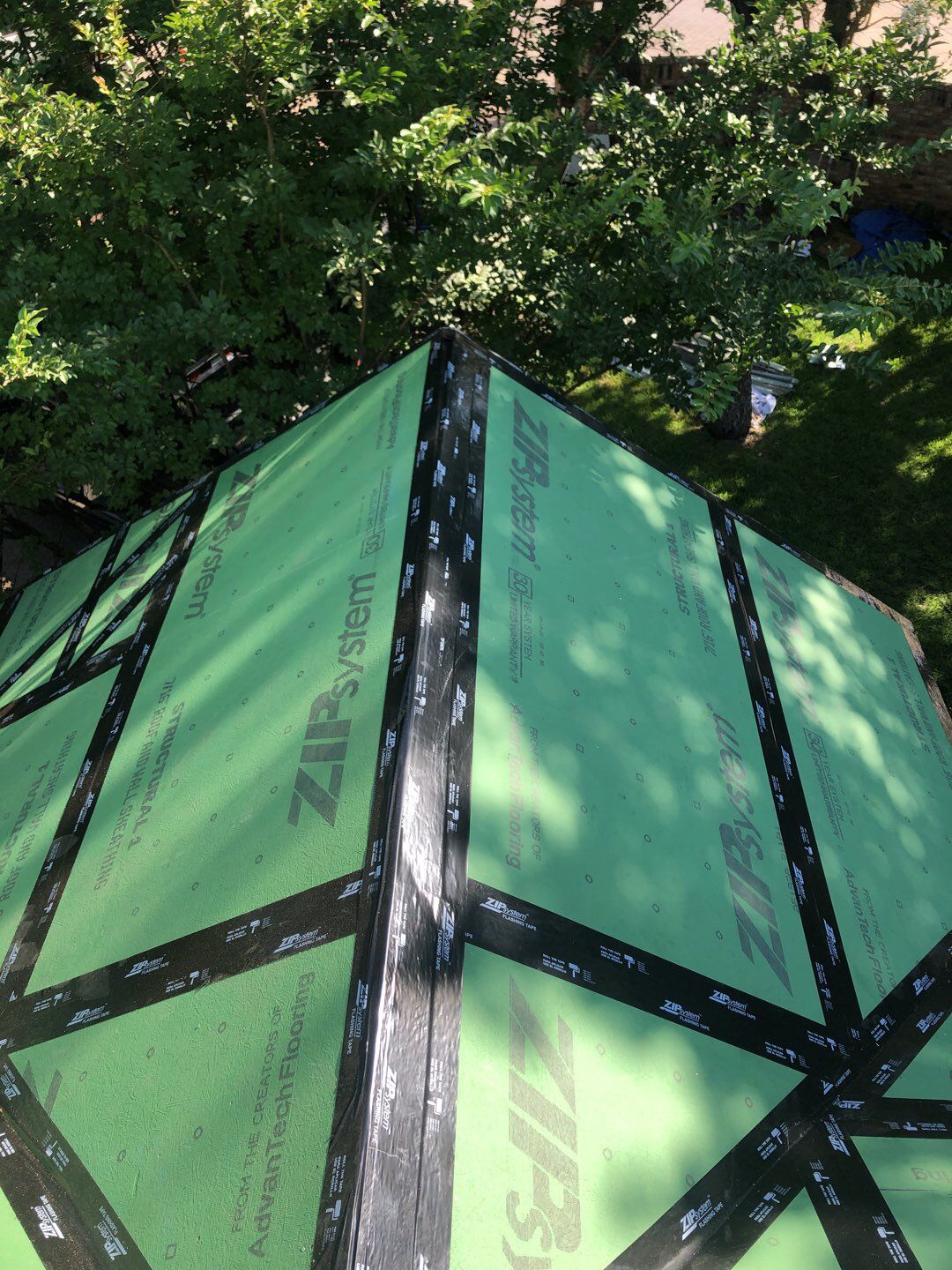 Designer Residential Roof with Zip System by Springtree Restoration