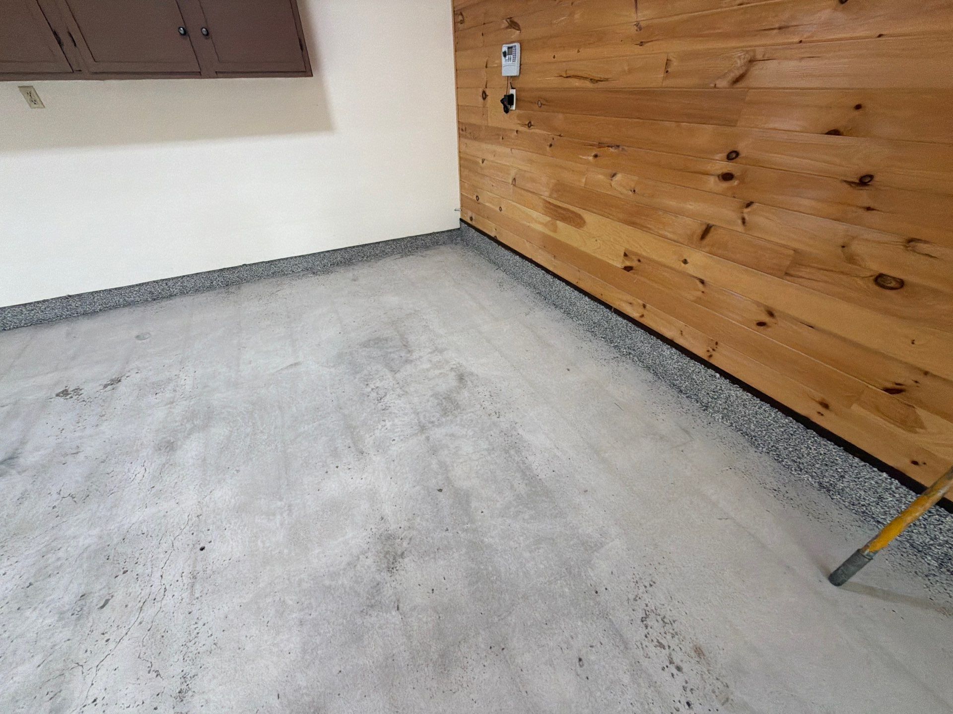 Gray Speckled Epoxy Flake Floor Coating in Muskegon by Gordon Painting